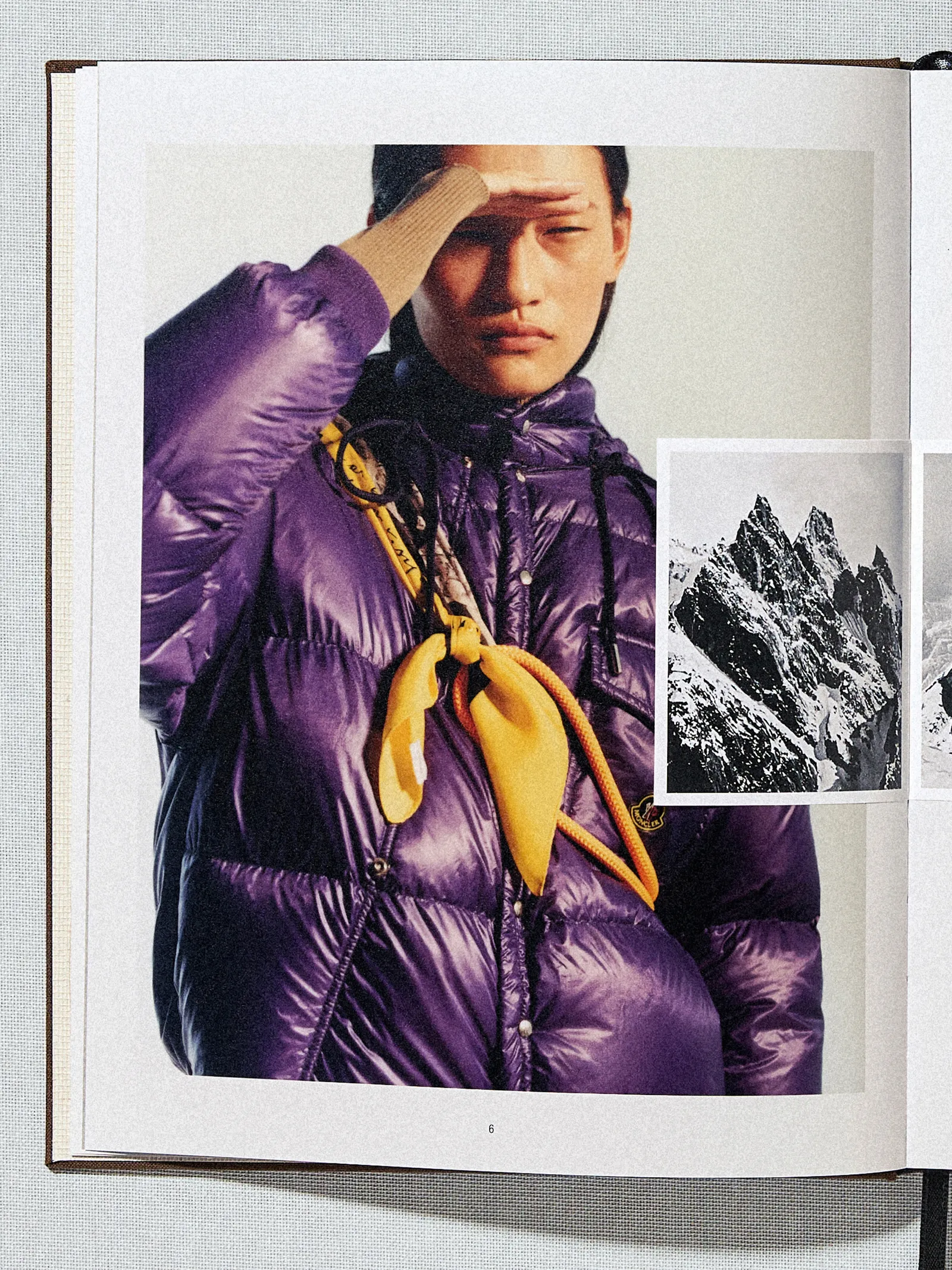 Image may contain Sonny Zhou Clothing Coat Jacket Vest Face Head Person Photography Portrait Adult and Glove