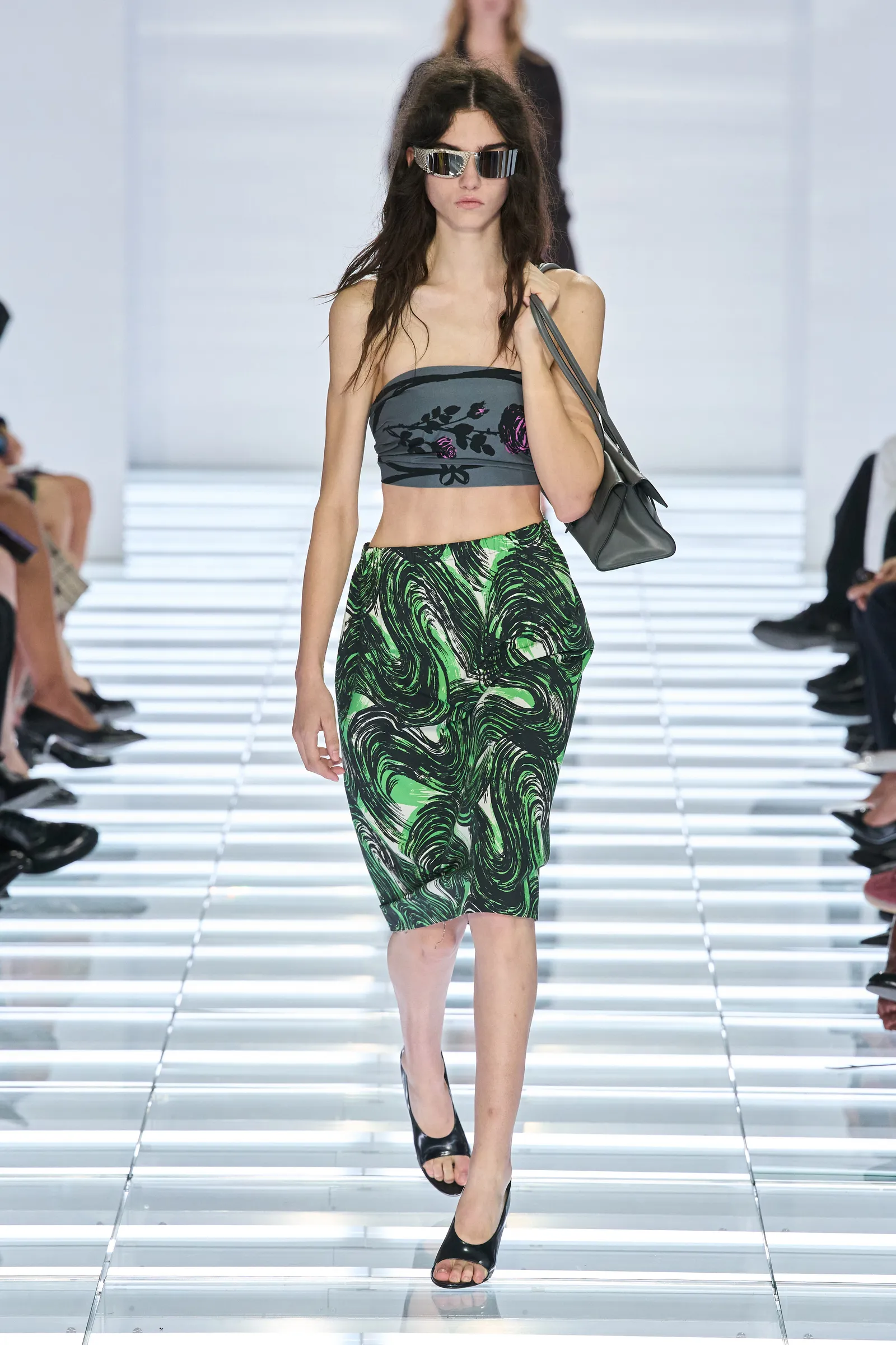 Image may contain Adult Person Fashion Clothing Skirt Runway Beachwear Footwear and Shoe