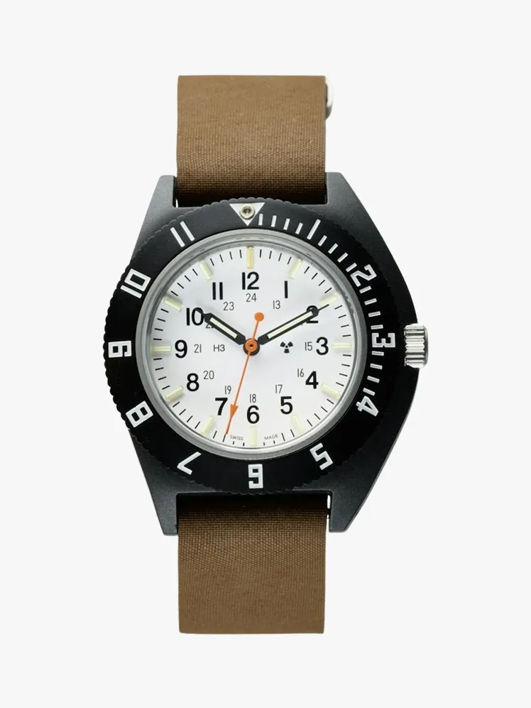 Image may contain: Wristwatch, Arm, Body Part, and Person