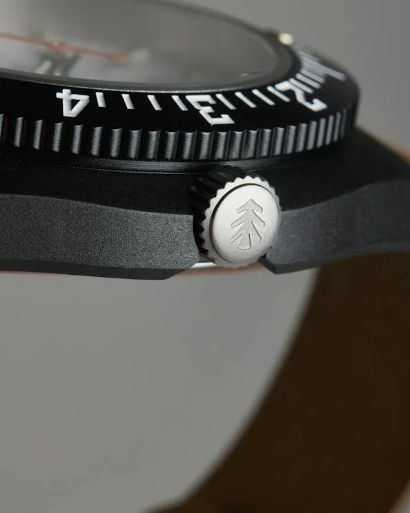 Image may contain Wristwatch Arm Body Part and Person
