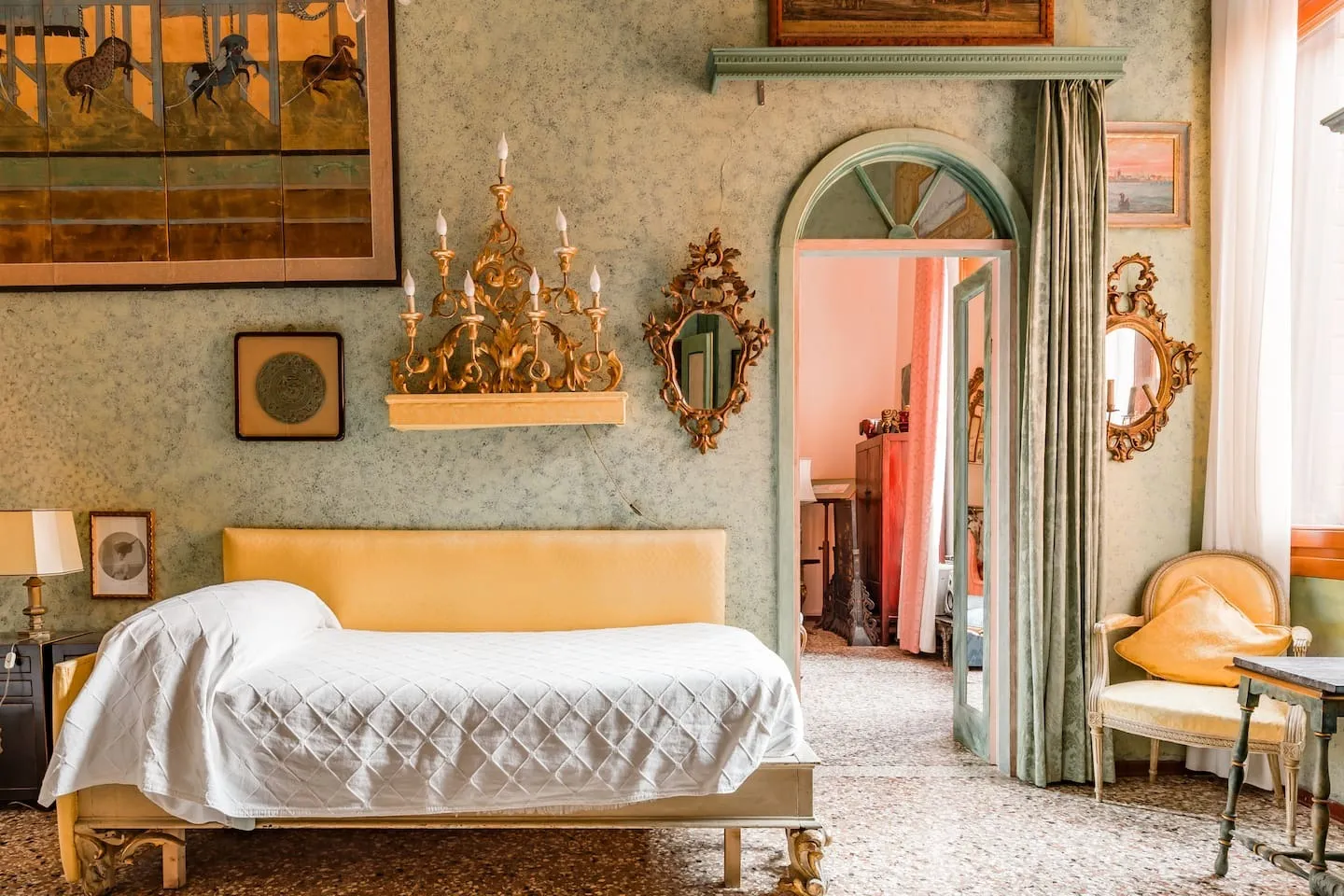 Image may contain Chandelier Lamp Bed Furniture Indoors Interior Design Home Decor and Candle