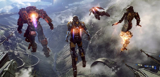 Four Anthem players in different-sized Javelin suits hovering high above the game's ruined sci-fantasy setting.
