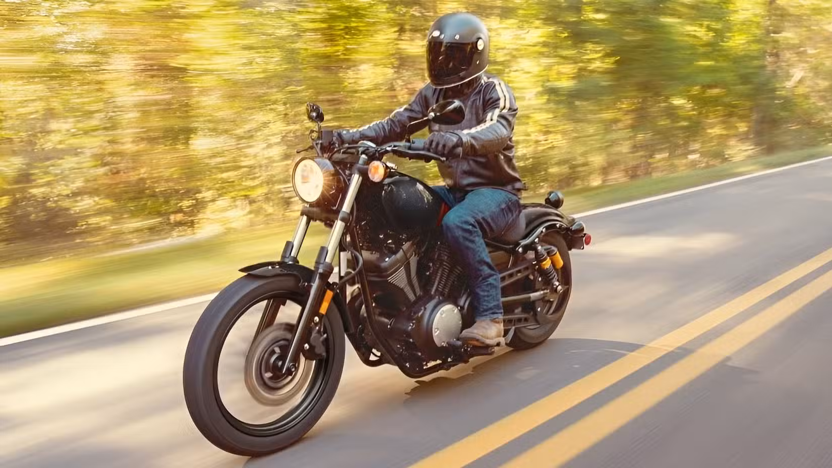 Action shot of a Yamaha Bolt R-Spec cruising down the road
