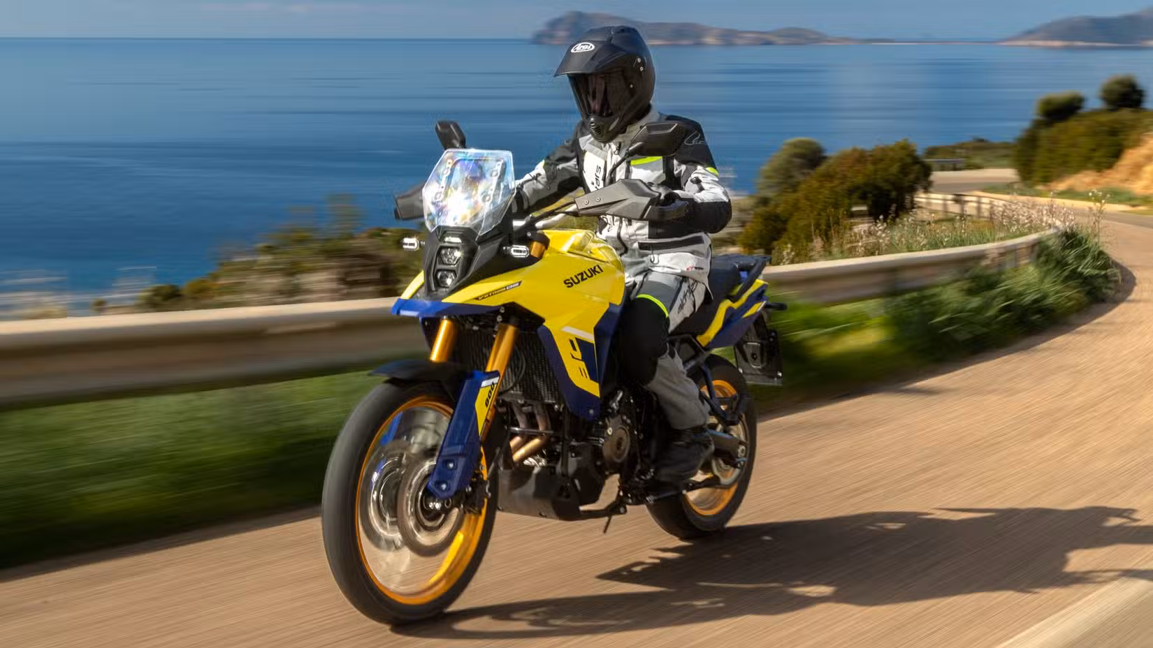 2025 Suzuki V-Strom 800 front 3/4 action shot