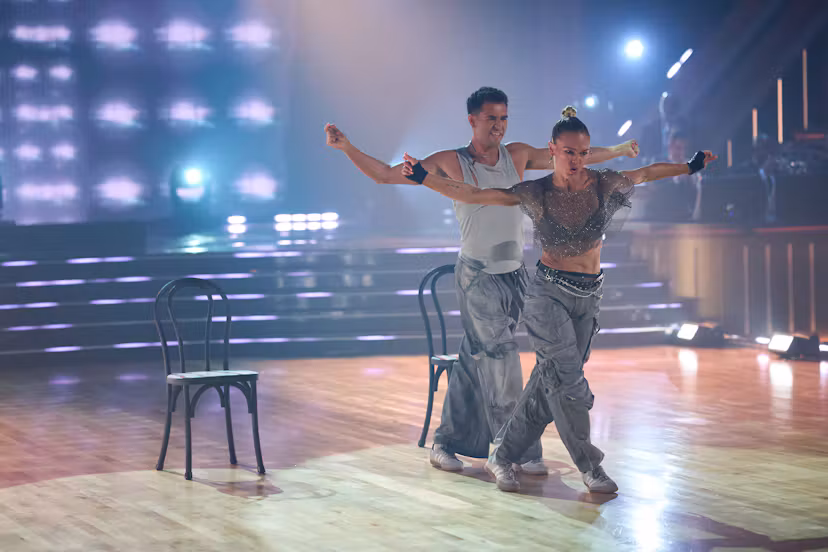 Ezra Sosa and Julia Stiles on DWTS. Photo via Disney