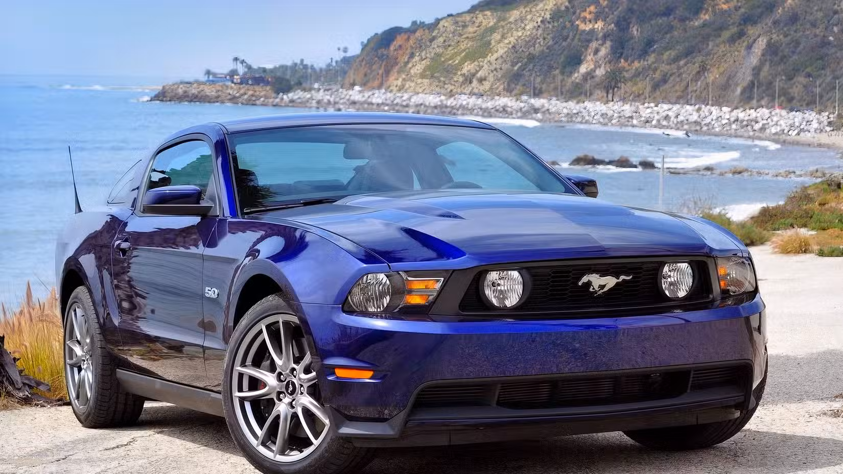 2011 Ford Mustang GT front shot parked by water