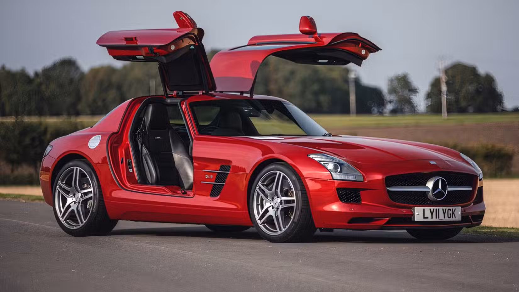 2011 Mercedes-AMG SLS front 3/4 shot with door open