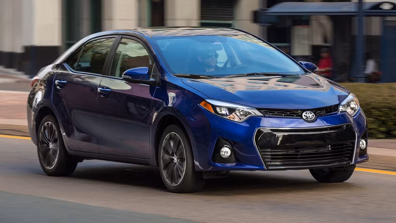 2014 Toyota Corolla front 3/4 shot driving