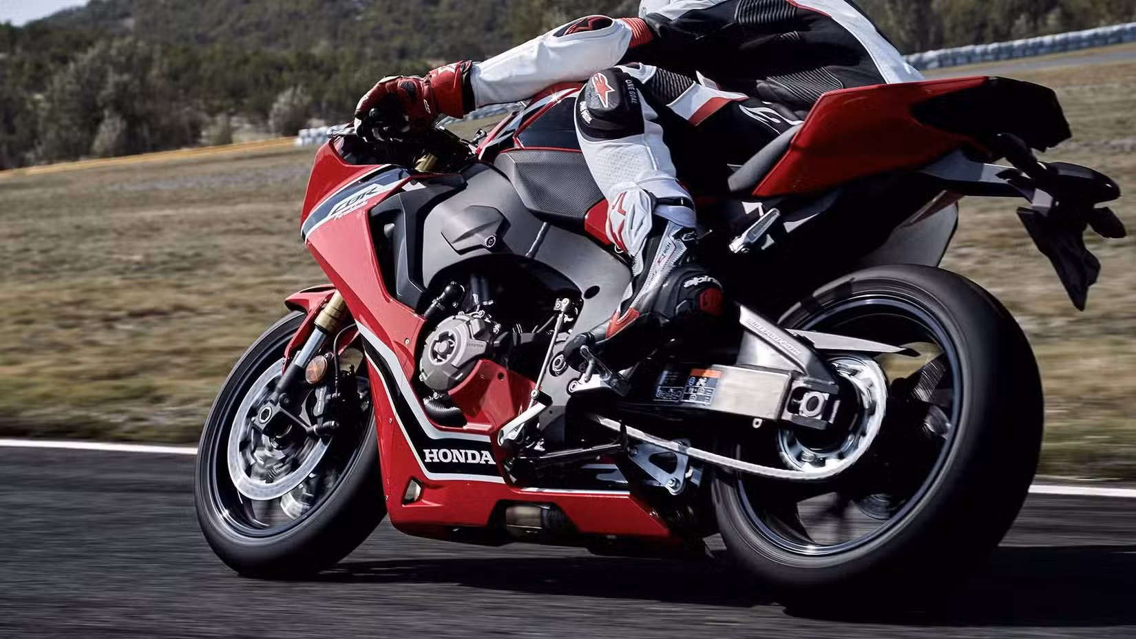 Action shot of a 2017 Honda CBR1000RR cornering on track
