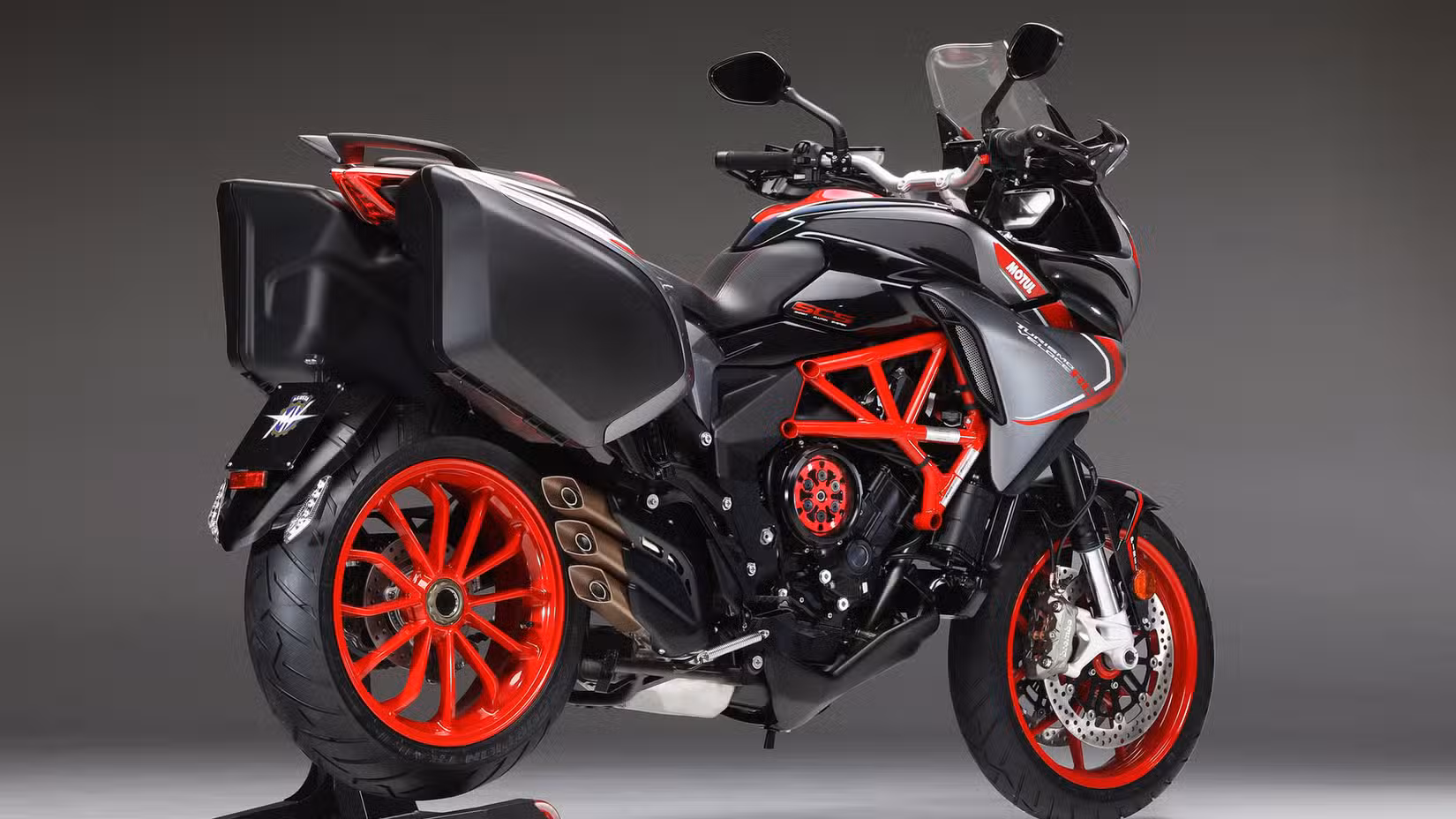 A rear 3/4 shot of the 2019 MV Agusta Turismo Veloce RC SCS in a studio