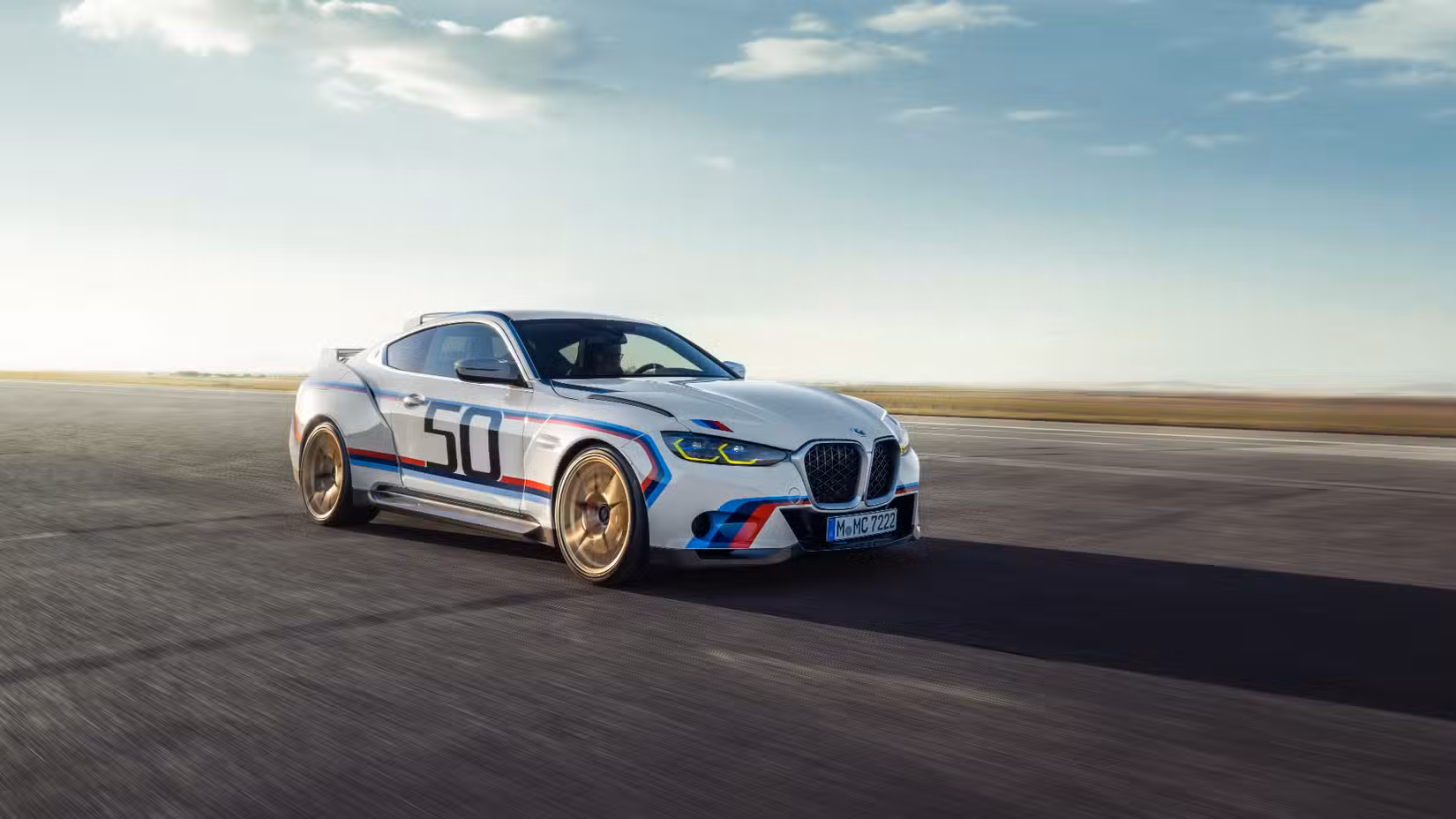 Front three-quarters view of the 2023 BMW 3.0 CSL posing on a track