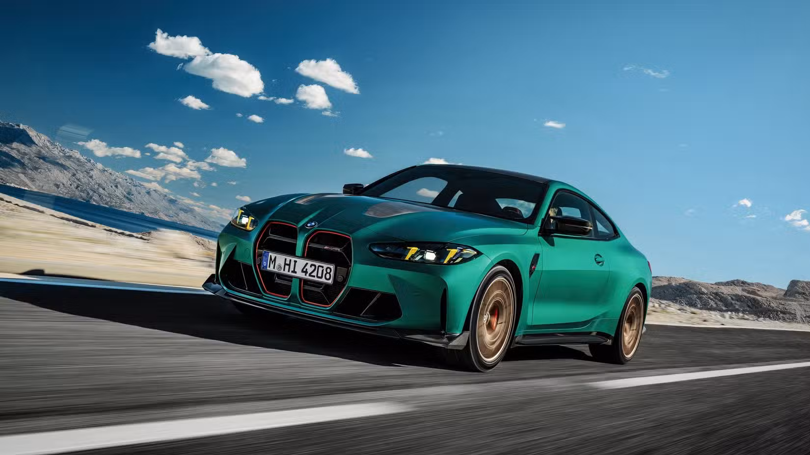Front 3/4 action shot of a 2024 BMW M4 CS