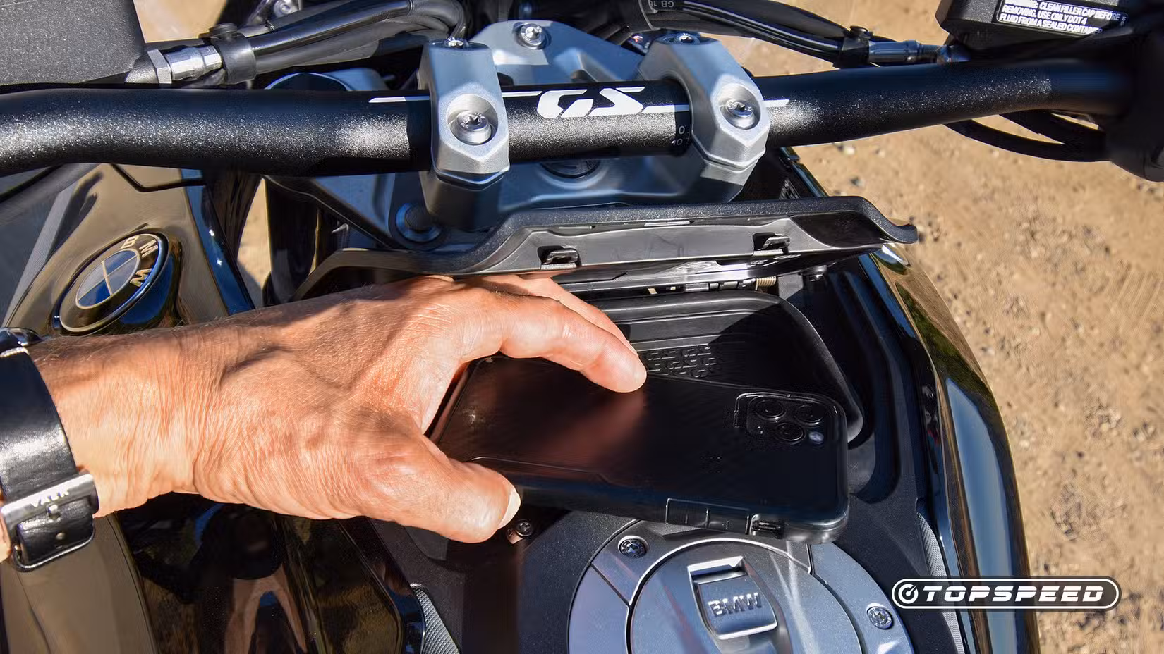 Phone compartment on a 2024 BMW R 1300 GS E2 close-up detail
