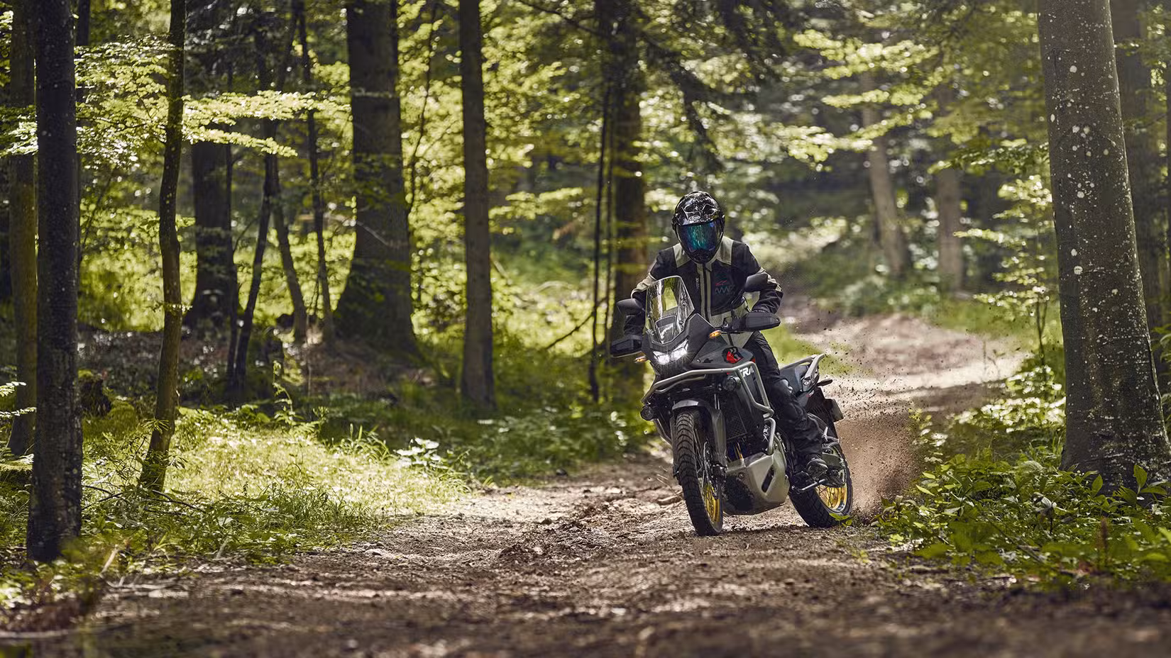 2025 Honda XL750 Transalp sliding the rear in the forest