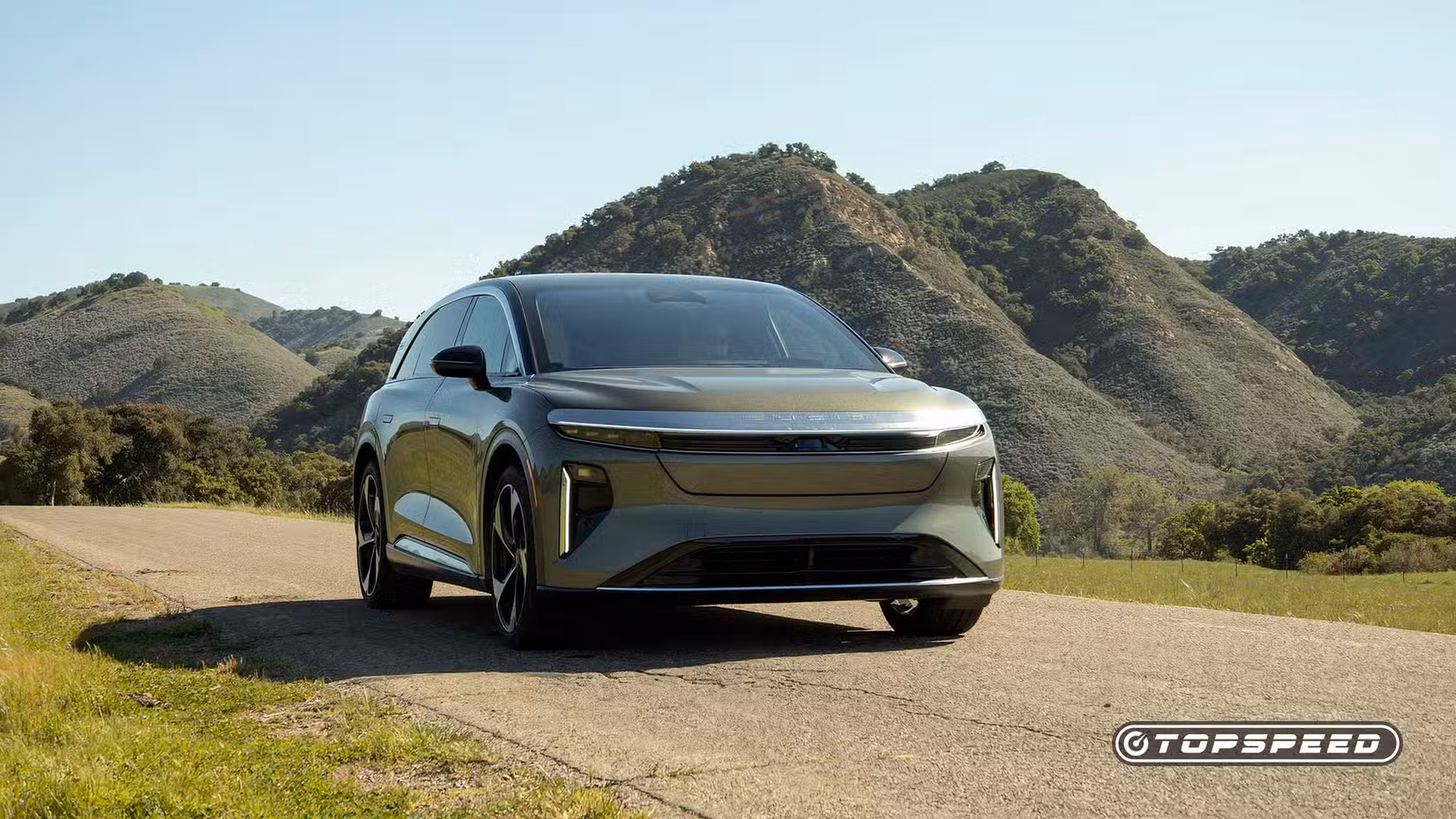 Front 3/4 action shot of 2025 Lucid Gravity driving