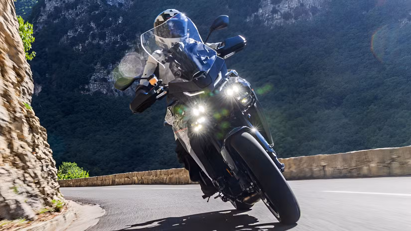 2026 Yamaha Tracer 9 leaning into a corner front fascia cinematic shot