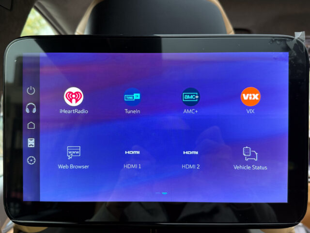 Cadillac Escalade IQ rear seat entertainment screen showing streaming apps and the web browser.