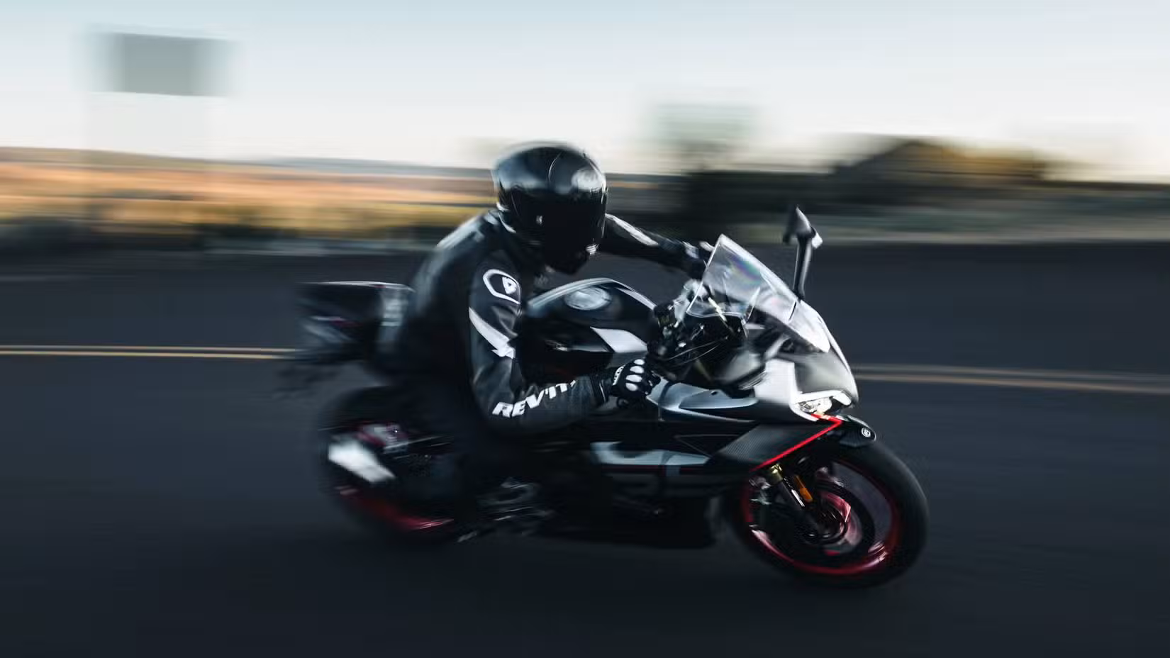 2026 CFMoto 450SS Taking A Right Turn Panning Shot