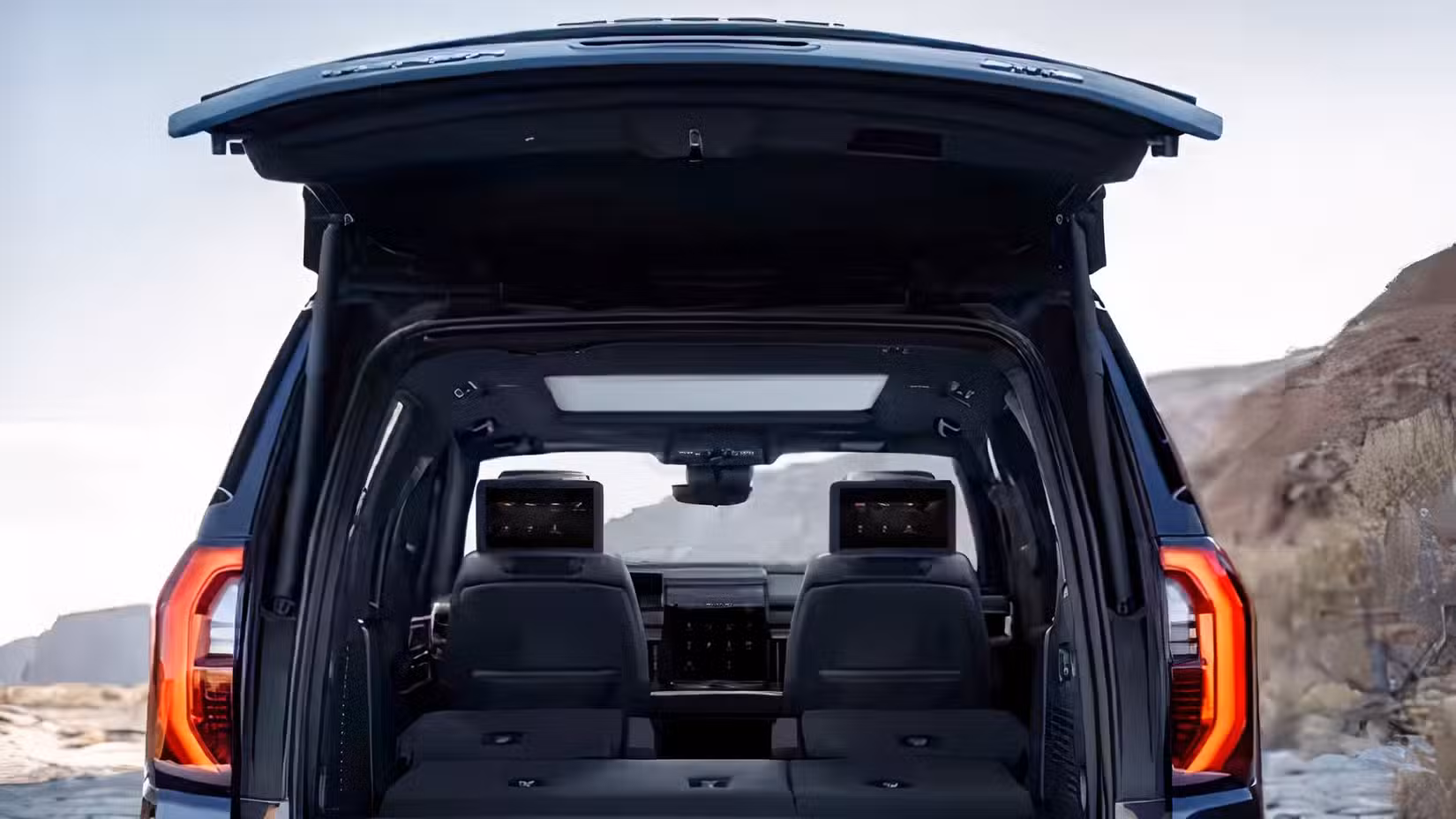 Rear shot of a 2026 GMC Yukon with Rear Liftgate Open