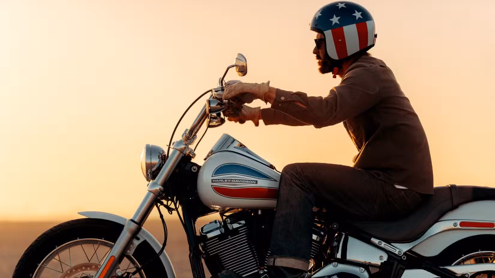 2026 Harley-Davidson Super Glide Riding into the sunset, cinematic close-up side profile shot