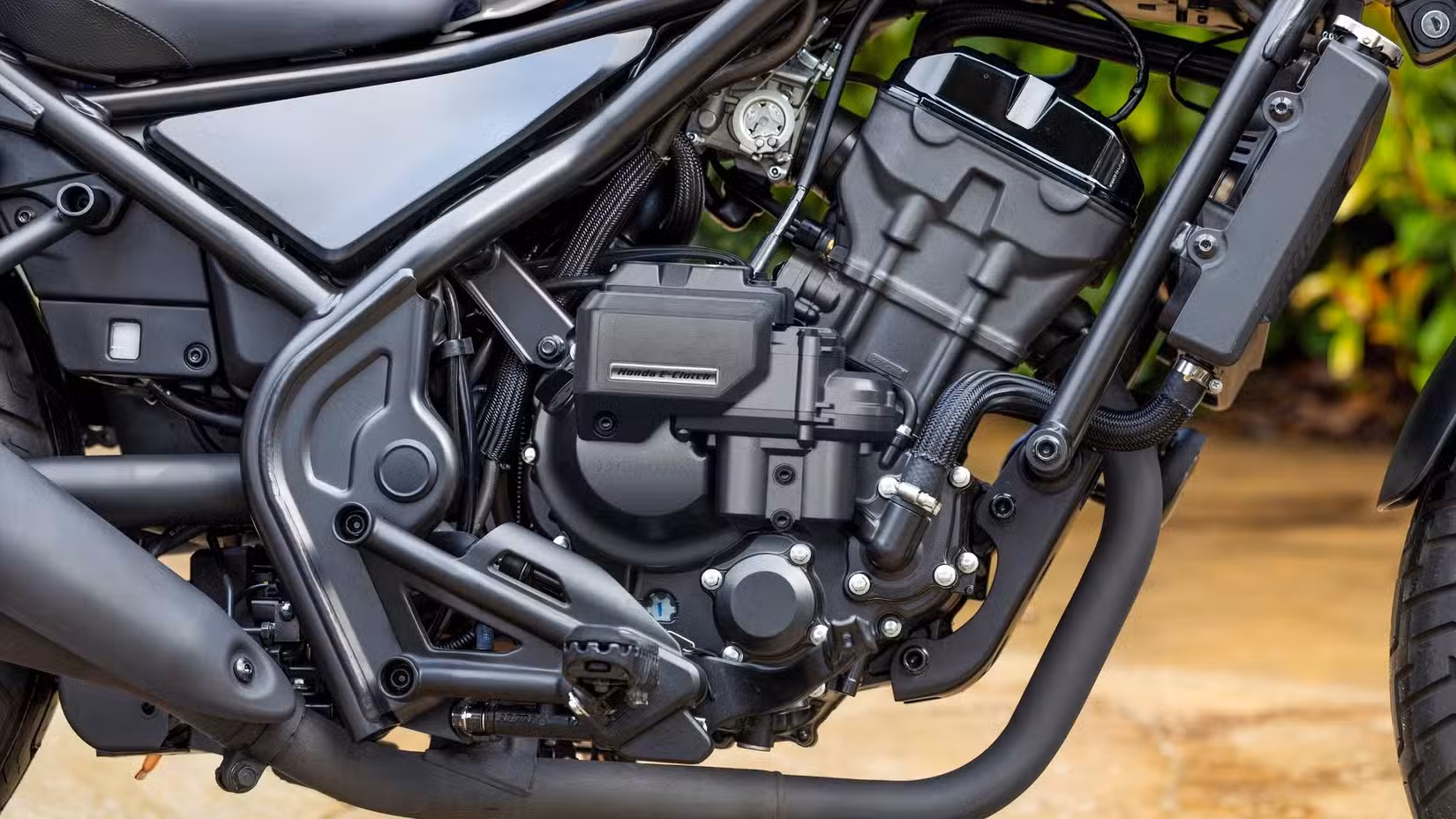 Close-up detail shot of a 2026 Honda Rebel 300 E-Clutch engine