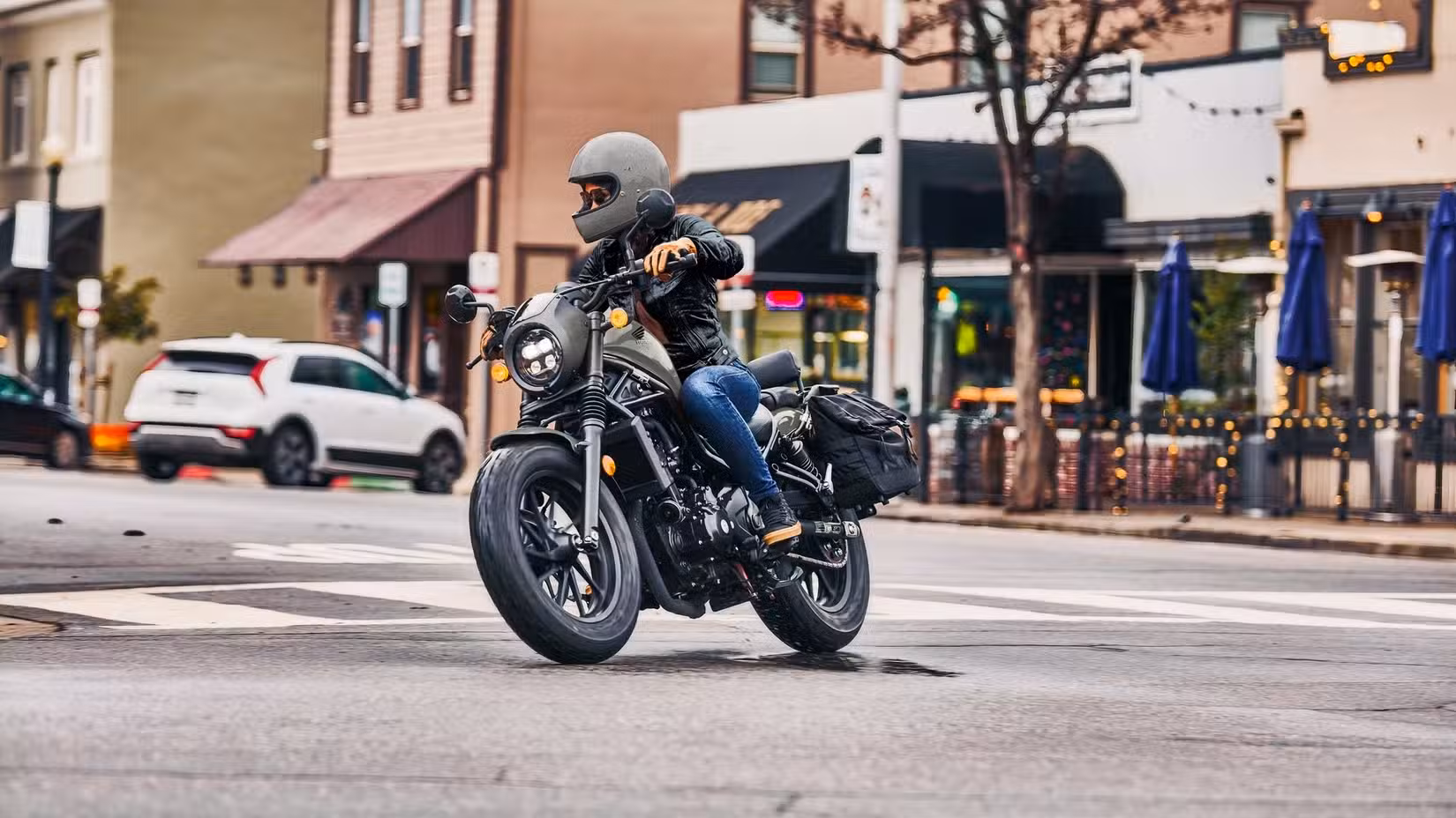 2026 Honda Rebel 300 E-Clutch front 3/4 cornering shot