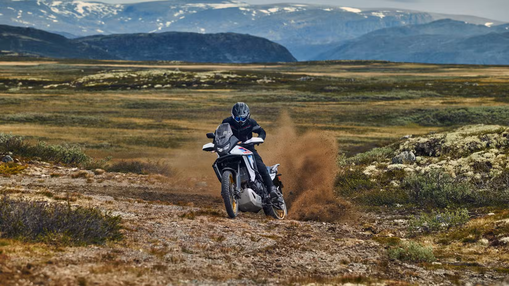 2026 Honda XL750 Transalp kicking up dirt in the great outdoors