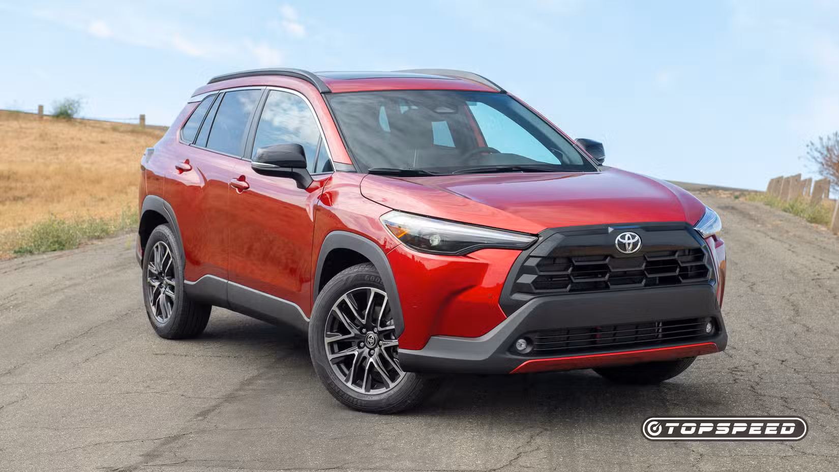 2026 Toyota Corolla Cross front 3/4 shot parked on the road