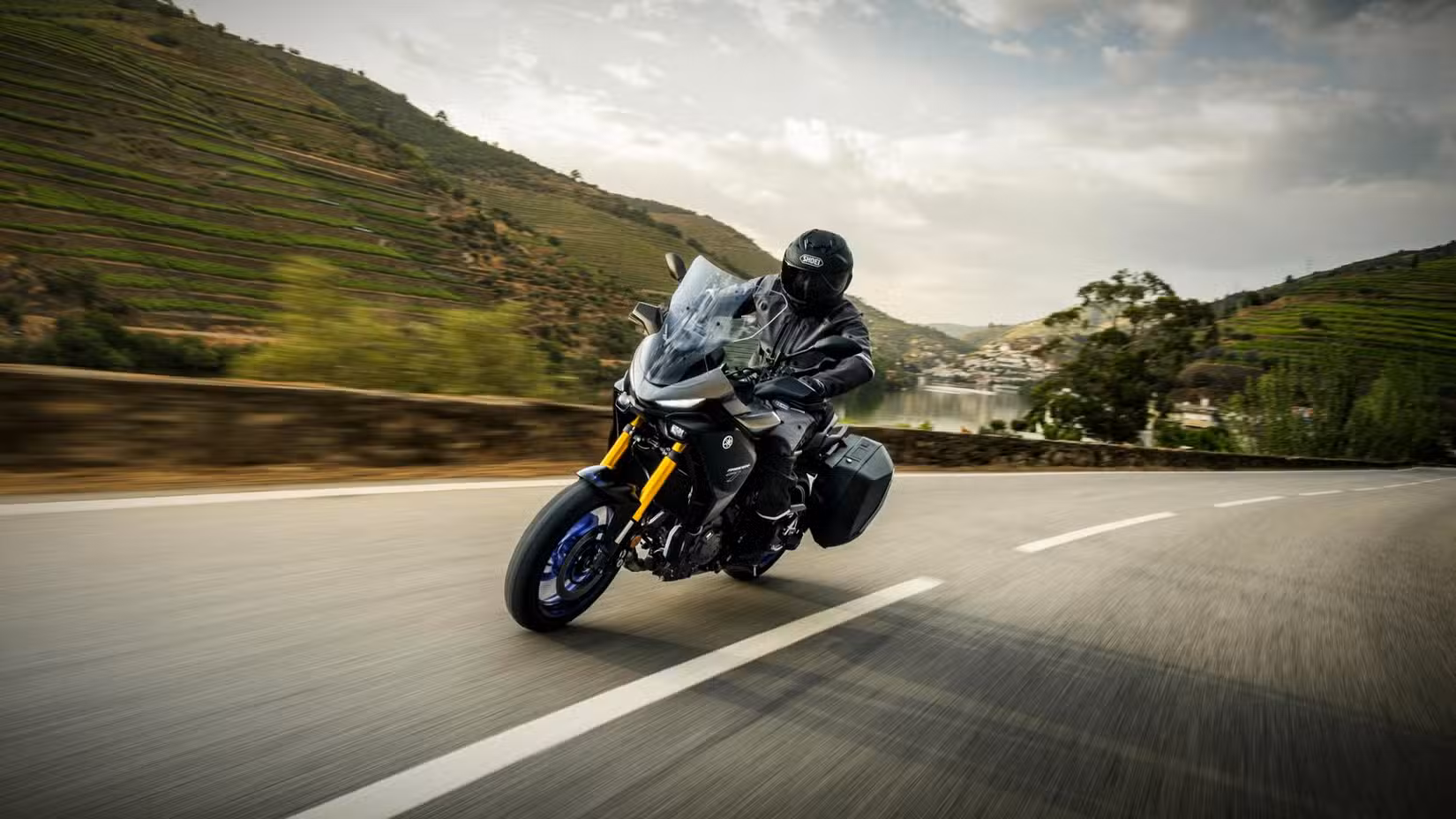 2026 Yamaha Tracer 7 GT riding through winding roads