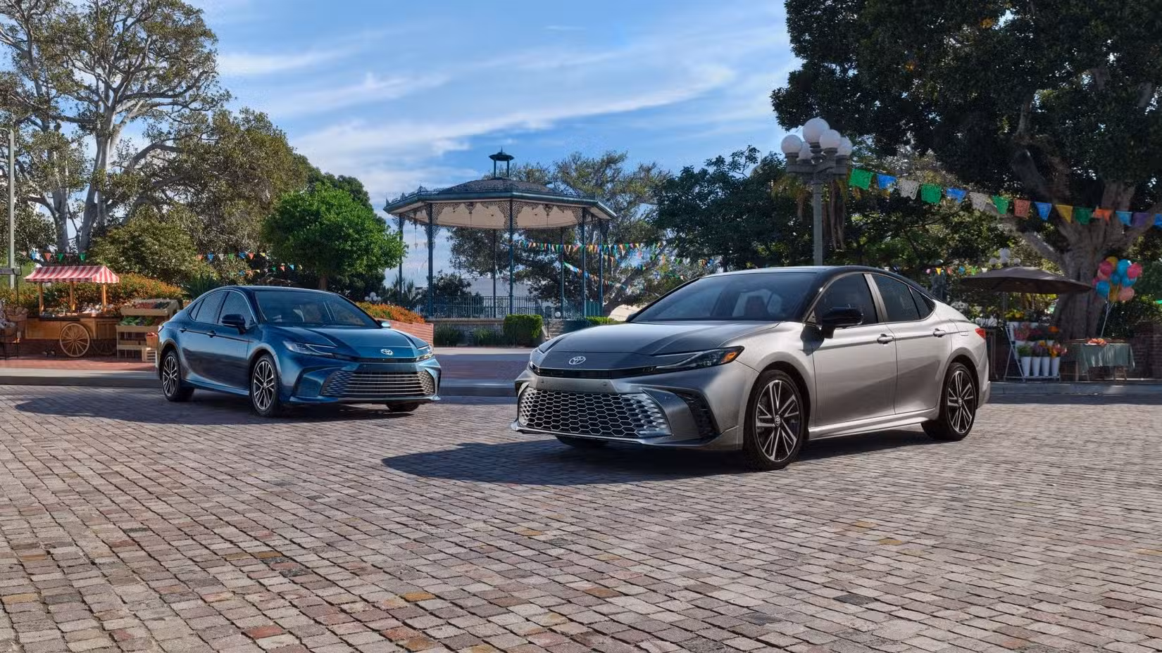 2026 Toyota Camry trim levels posed on brick road