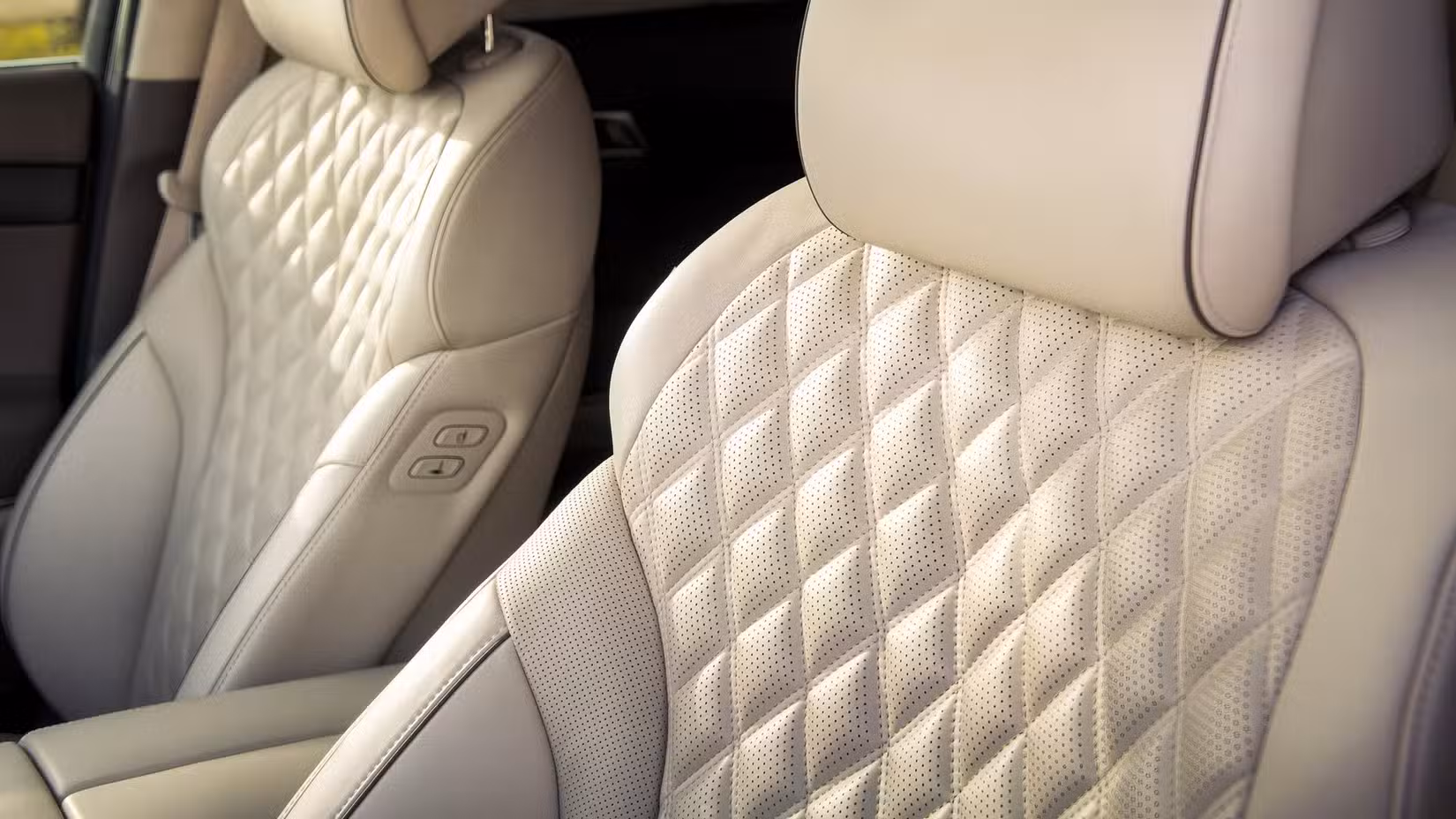 2027 Genesis GV80 interior shot showing Front Seats