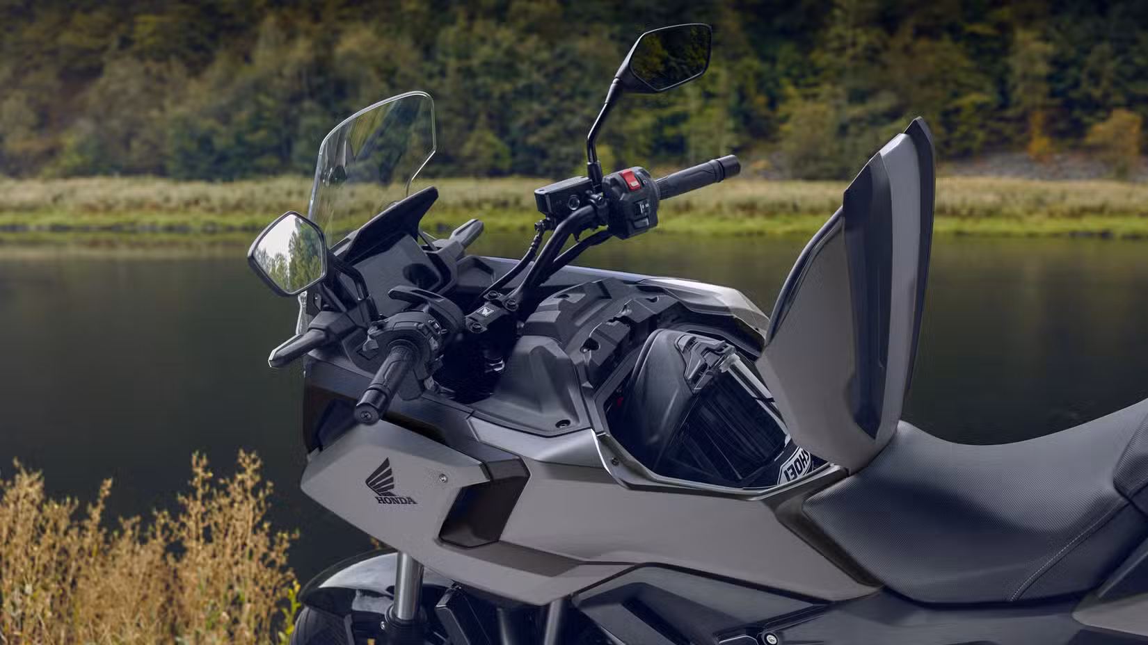 2027 Honda NC750X DCT with the front storage compartment open