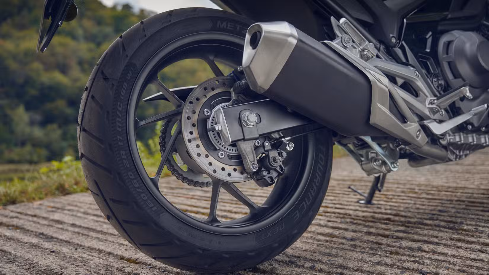 2027 Honda NC750X DCT close-up shot of the rear wheel