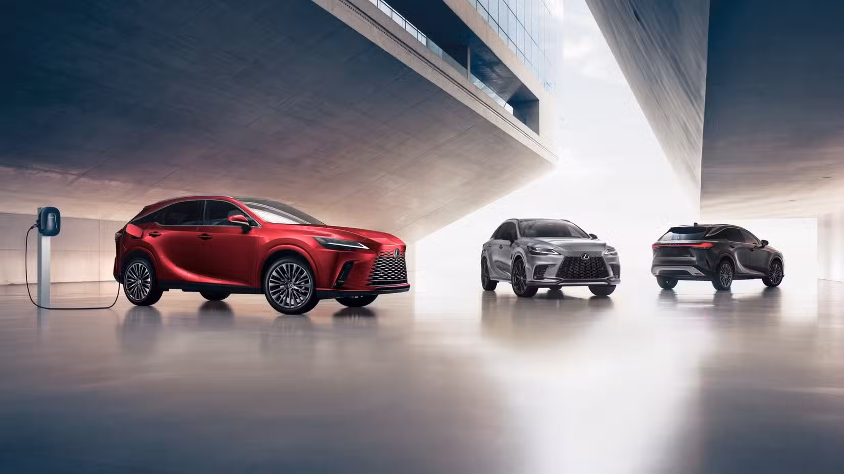 A Lexus RX trim lineup featuring the 2027 Lexus RX 450h in red.