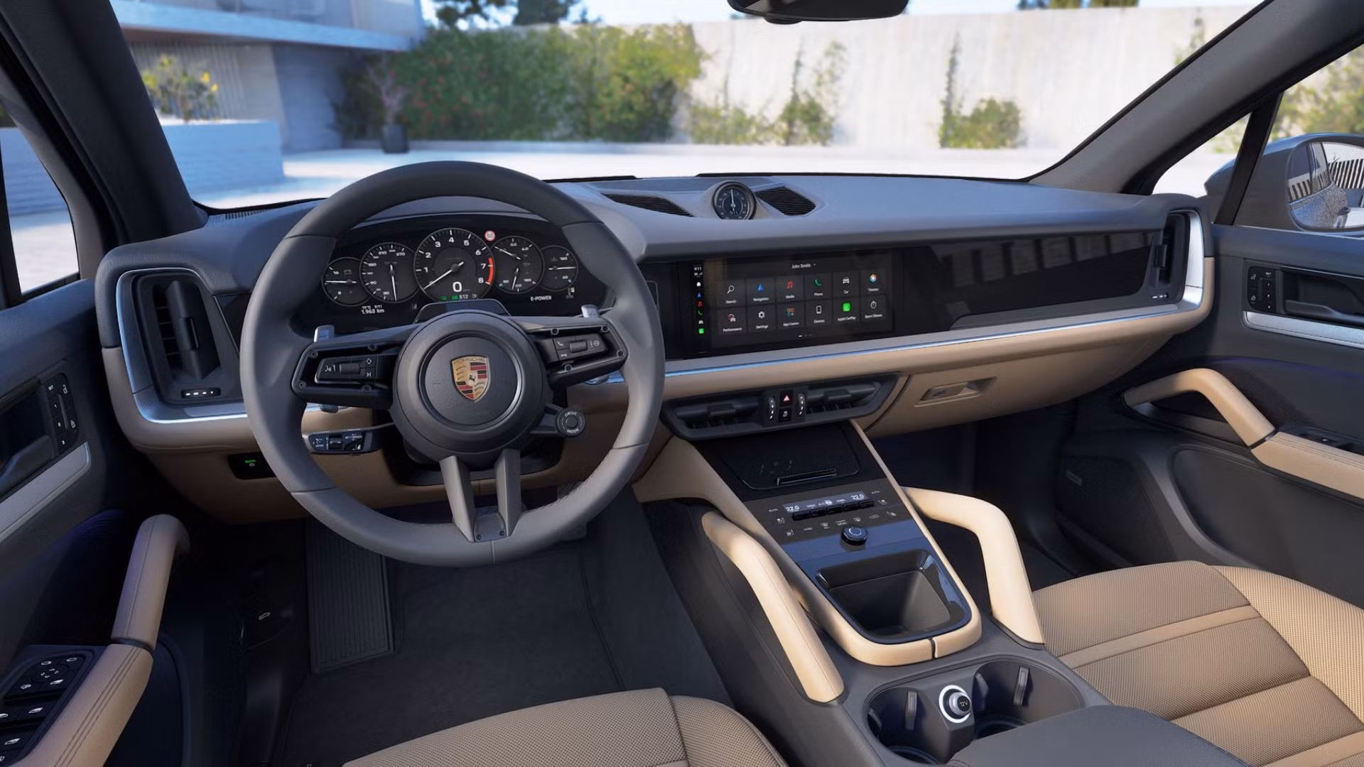 The front dashboard view of a grey 2027 Porsche Cayenne E-Hybrid.
