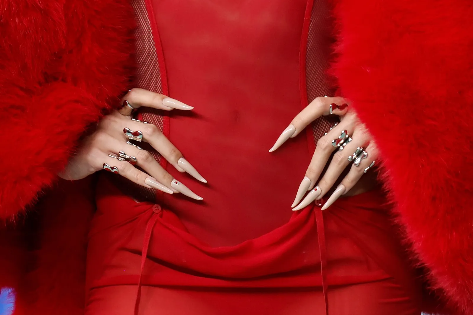 Image may contain Body Part Finger Hand Person Adult Nail Electronics Hardware Accessories Jewelry and Ring