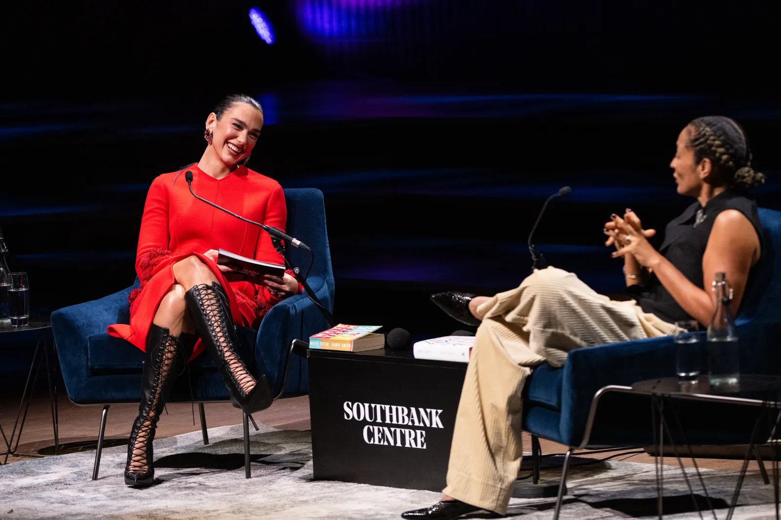LONDON ENGLAND  OCTOBER 24  Dua Lipa and Zadie Smith onstage during Dua Lipa In Conversation With Zadie Smith at the...