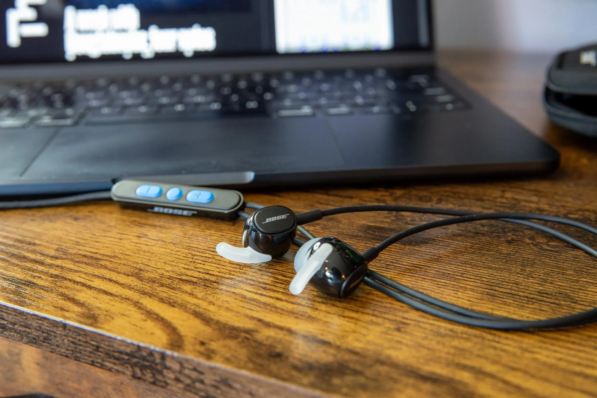 Bose Noise Cancelling Wired Earbuds on desk