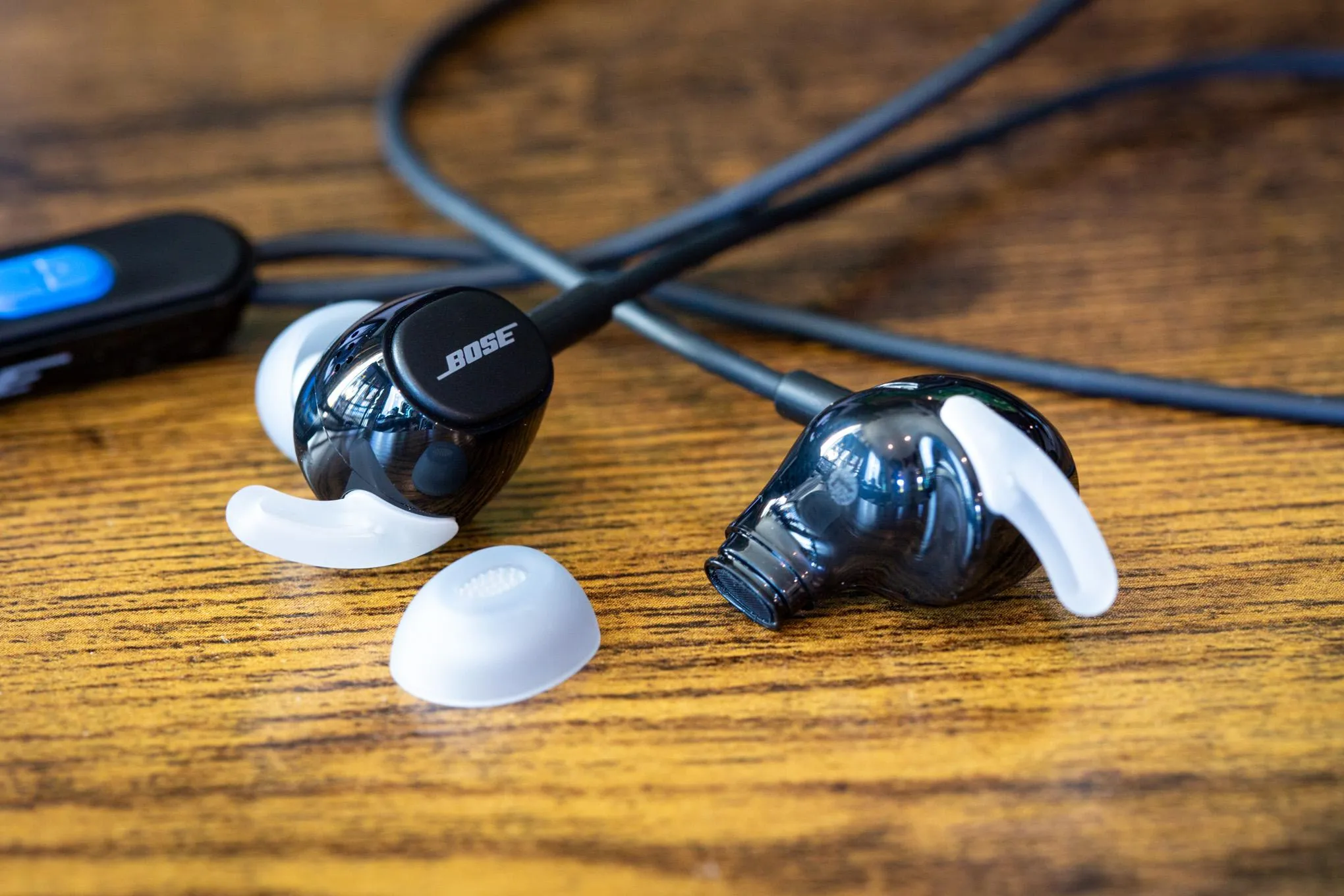 Bose Noise Cancelling Wired Earbuds on desk