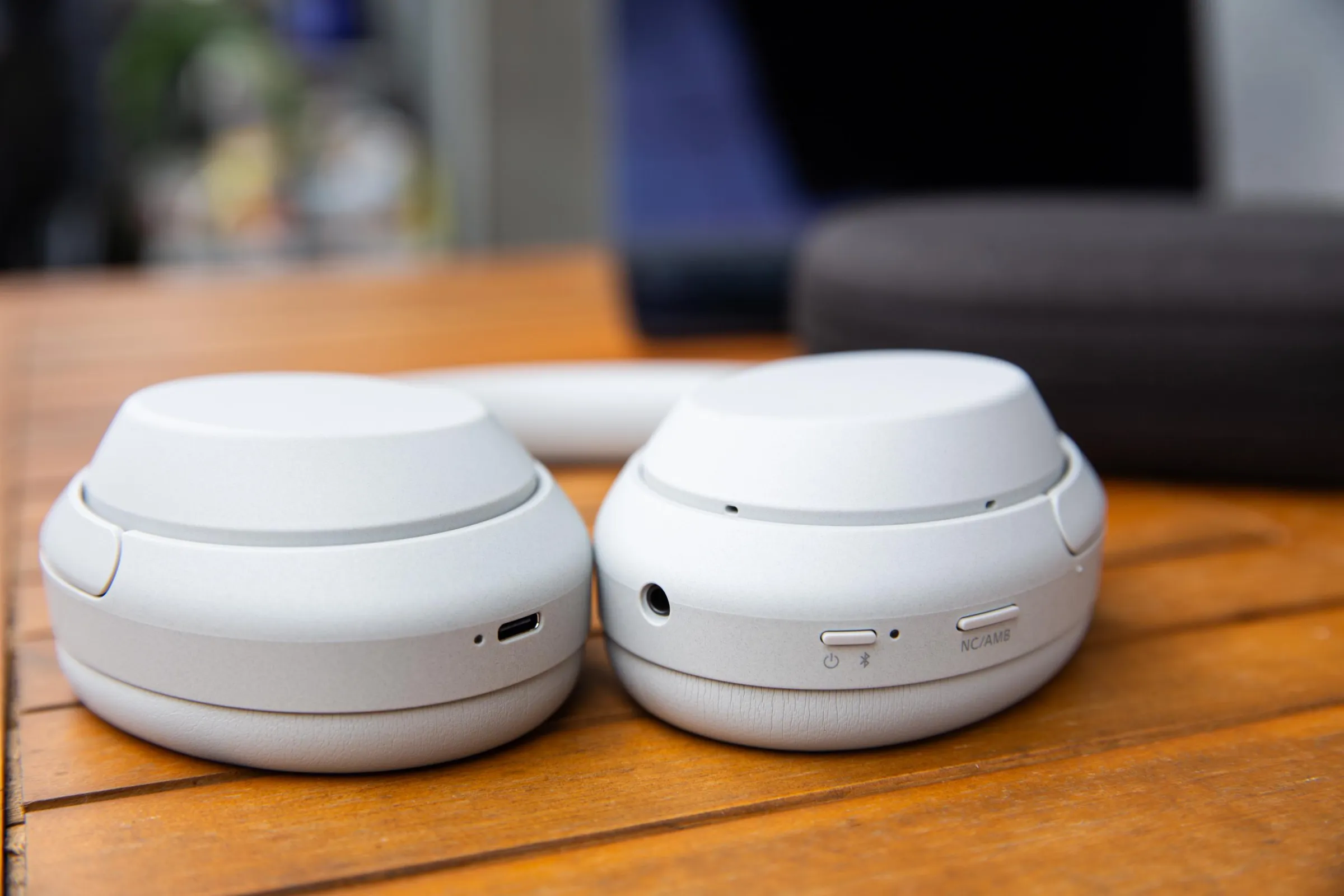 A view of Sony’s XM4C headphones shows the 3.5mm jack, USB-C port, and buttons.