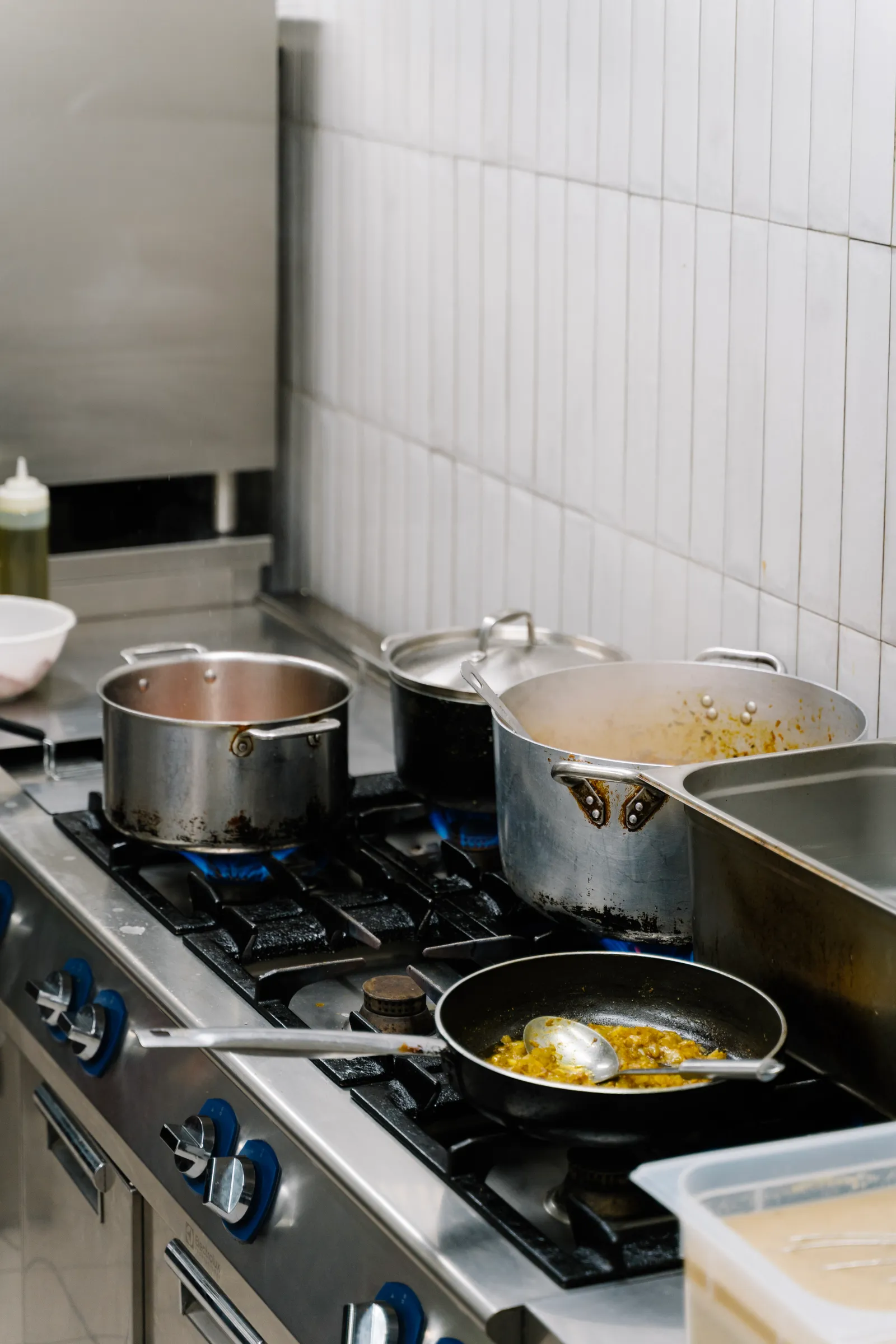 Image may contain Cooking Pot Cookware Food Pot Cooktop Indoors Kitchen and Cooking Pan