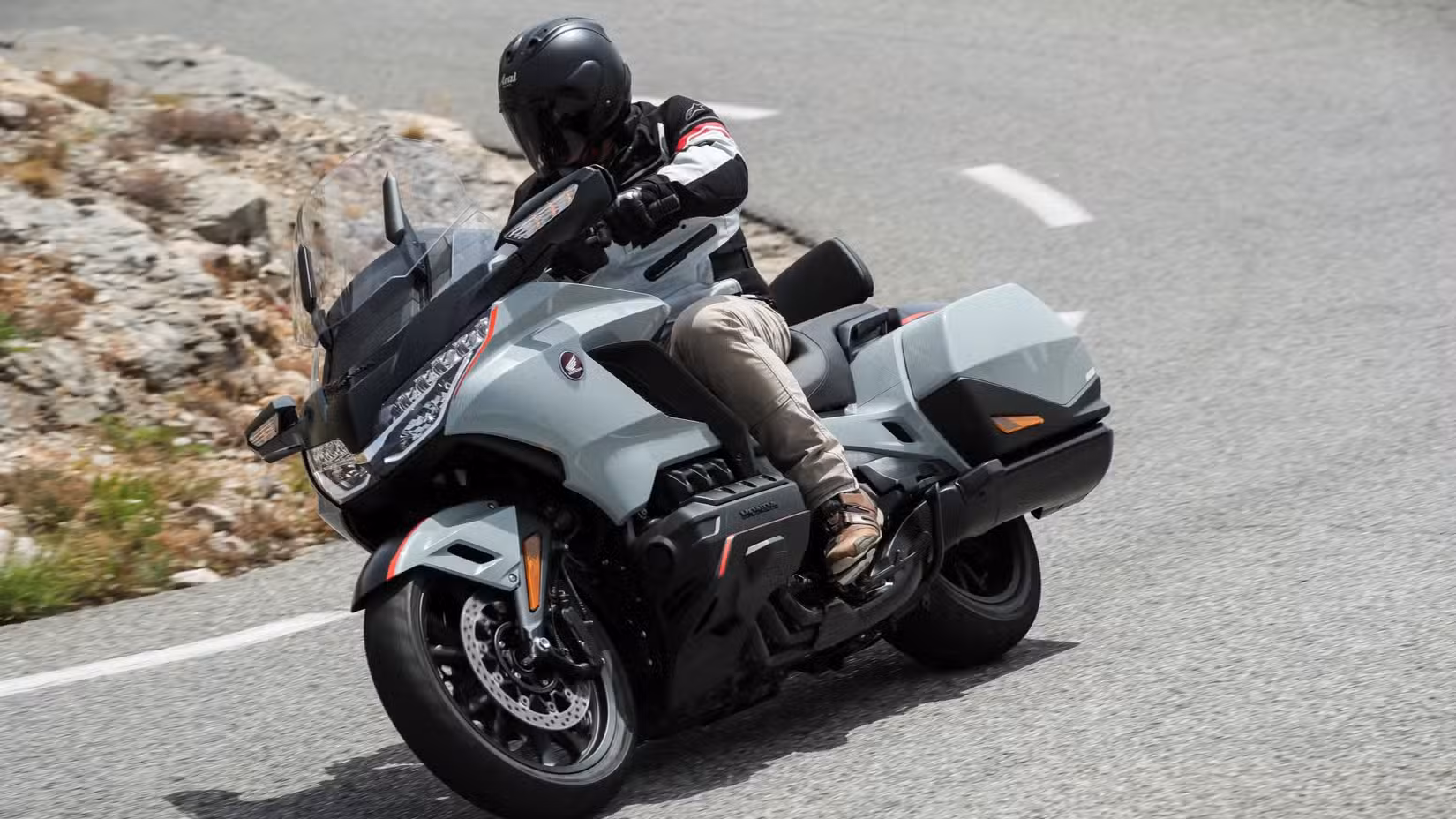 A 2020 Honda Gold Wing cornering on a mountain road