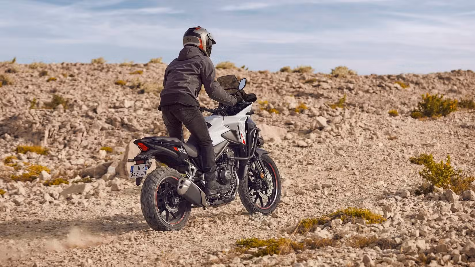 Rear quarter shot of a 2026 Honda NX500 off-roading