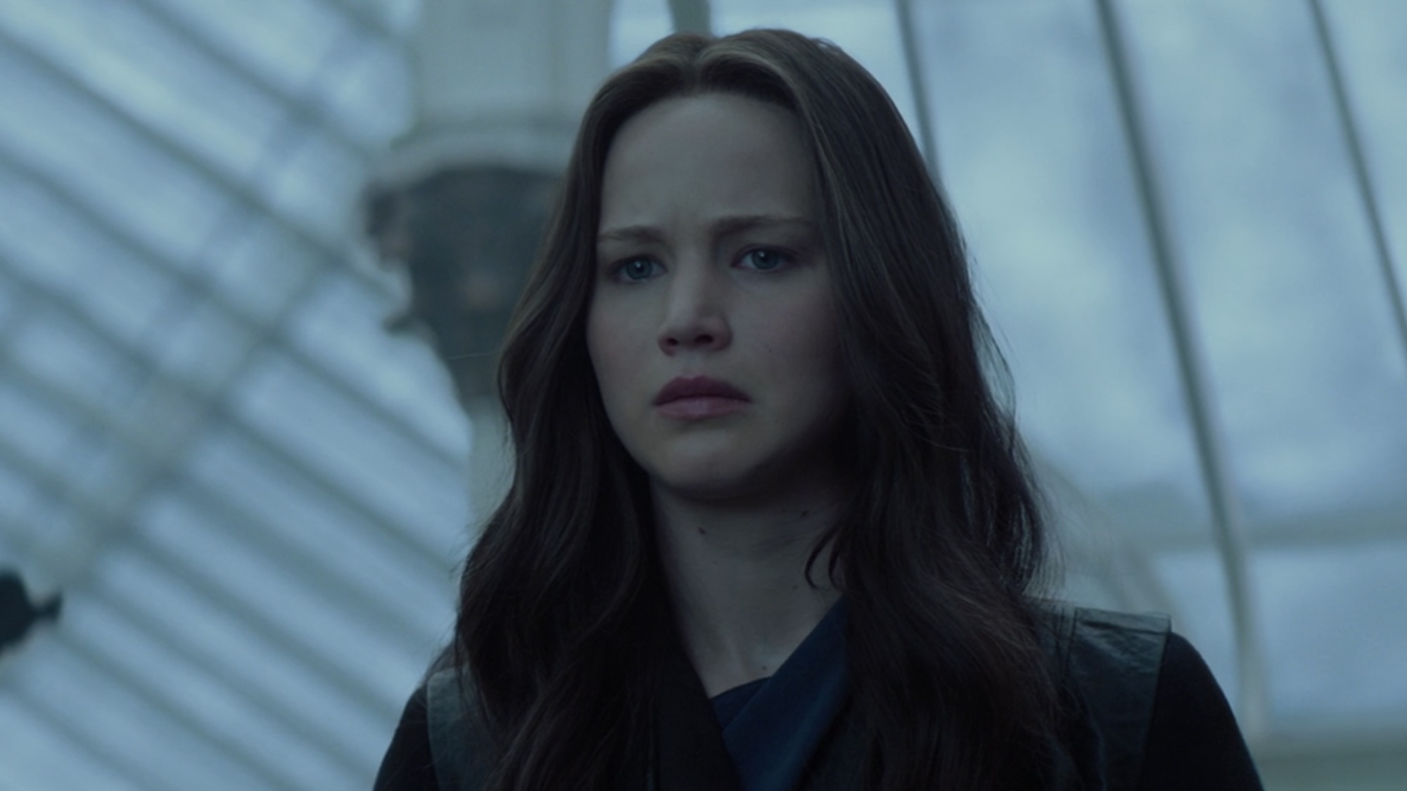 Katniss looking upset talking to Coin at the end of Mockingjay - Part 2.