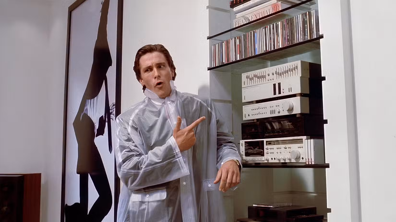 Patrick points at his music collection in American Psycho