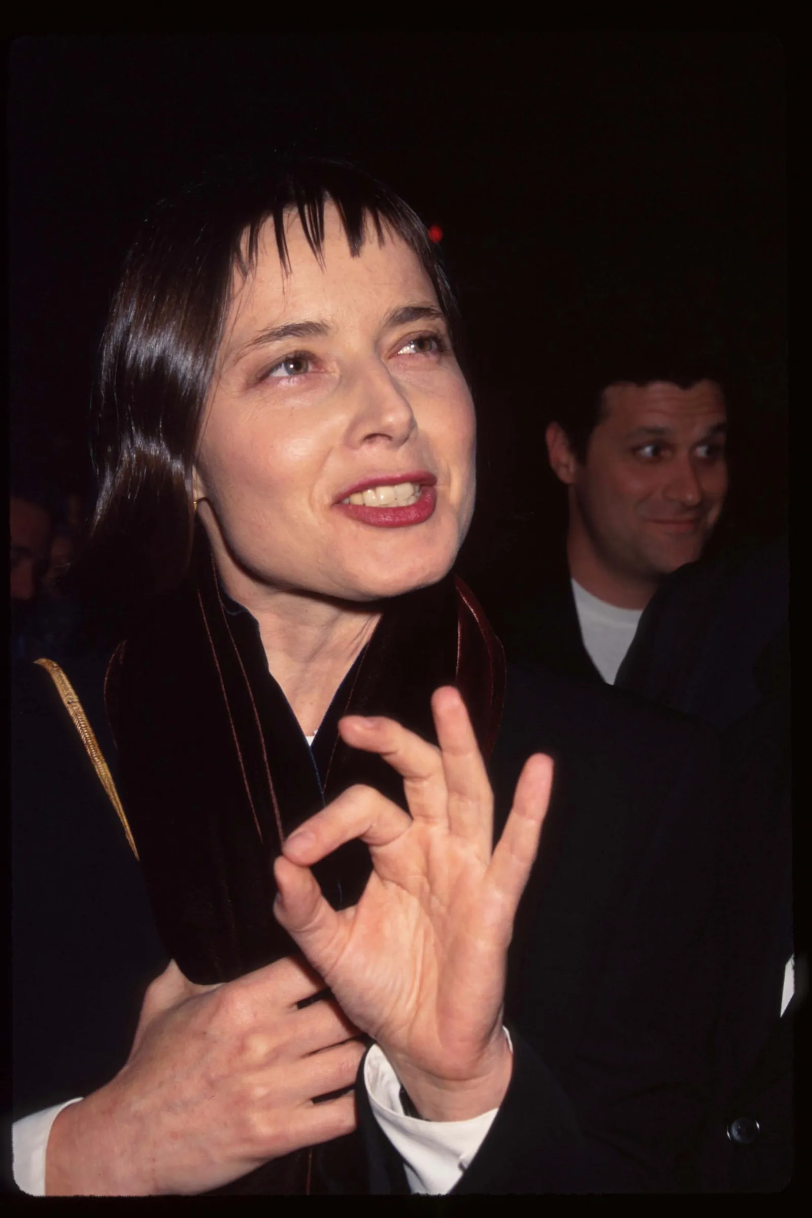 Image may contain Isabella Rossellini Isaac Mizrahi Face Head Person Photography Portrait Body Part Finger and Hand
