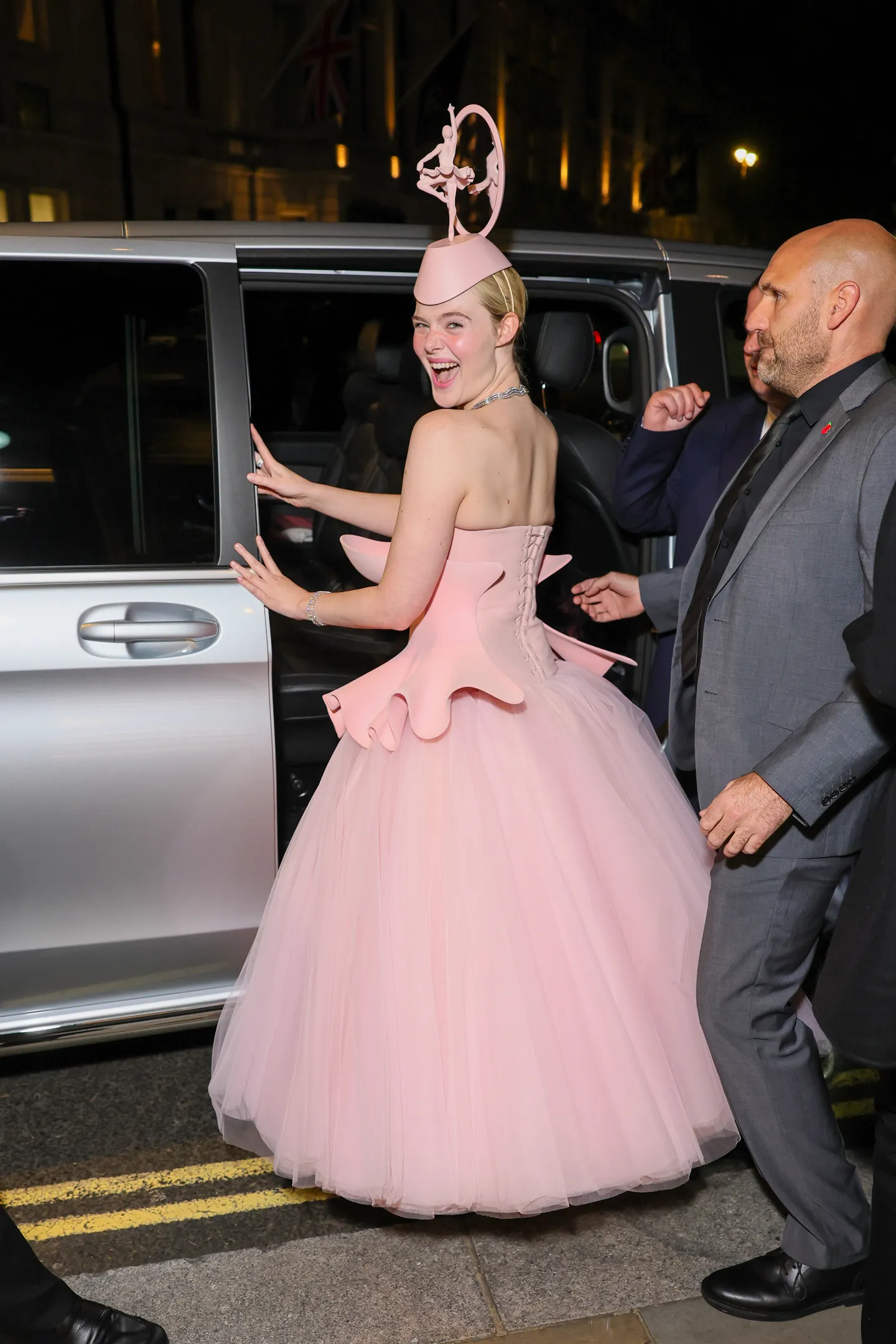 London UNITED KINGDOM Elle Fanning was spotted leaving the Corinthia Hotel ahead of The Hunger Games premiere wearing a...