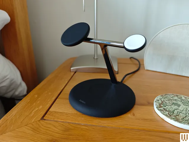 Image may contain: Wood, Plywood, Electrical Device, Microphone, Furniture, Table, Hardwood, Tabletop, Person, and Desk