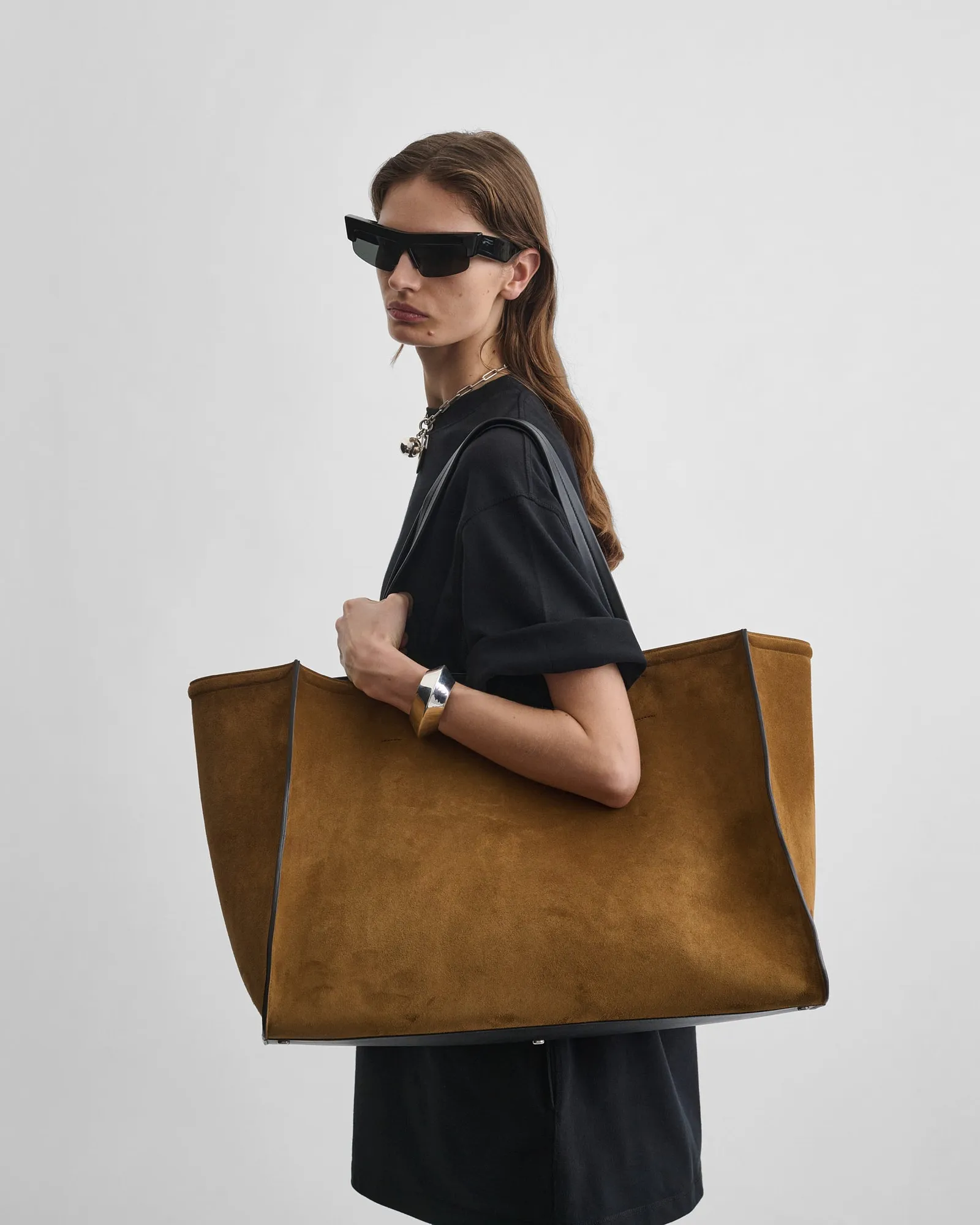 Image may contain Accessories Bag Handbag Tote Bag Purse Person and Teen