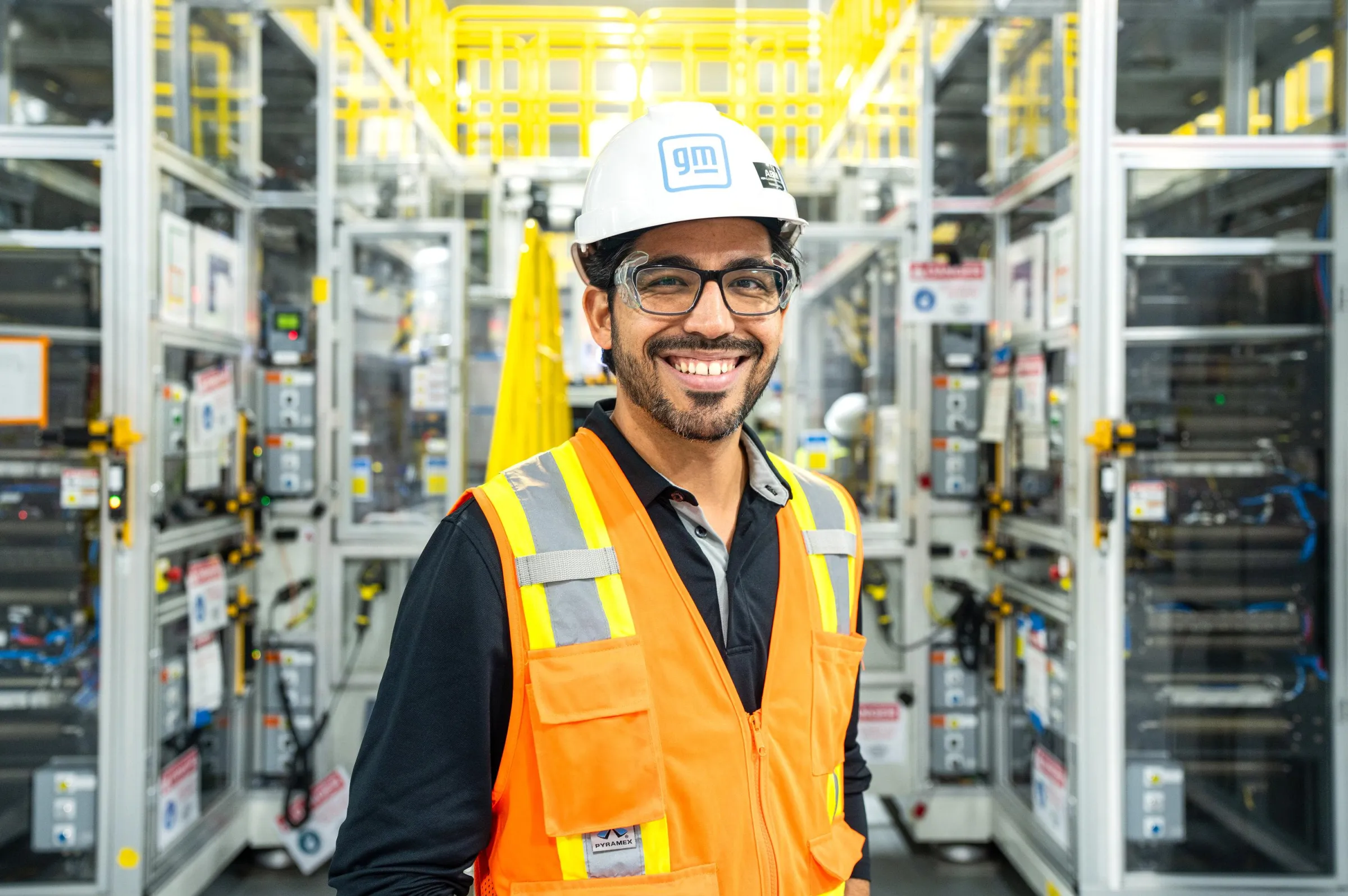 Mo Gallegos, head of GM’s new Battery Cell Development Center, with machinery that lets its engineers prototype production of new cells before transferring the process to full-scale factories.